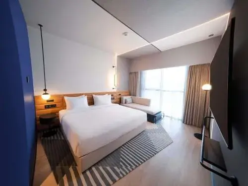 Deluxe King Room with Sofa Bed in Novotel Madinah Deluxe King Room with Sofa Bed in Novotel Madinah