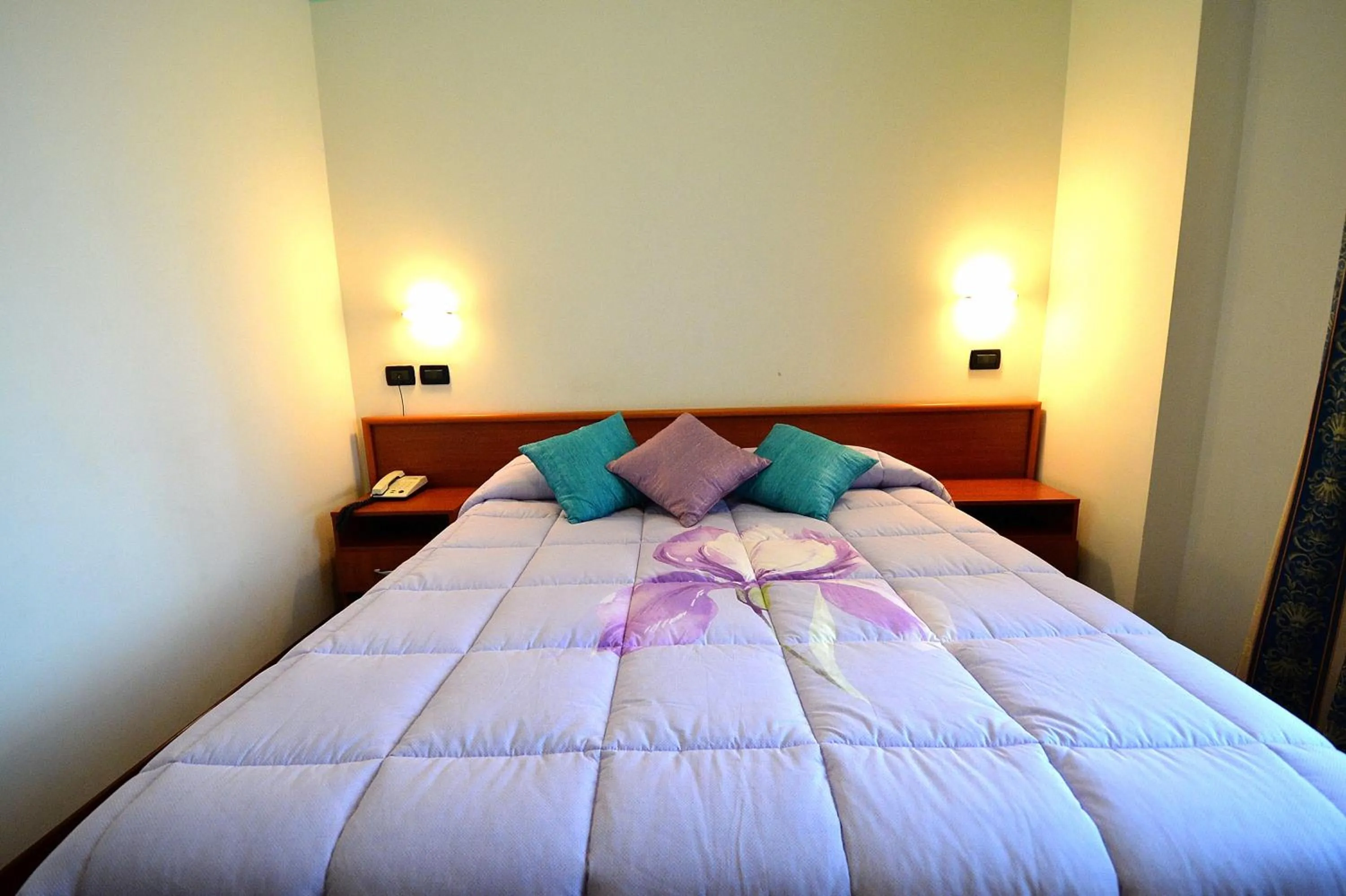 Bed in Hotel La Cantina