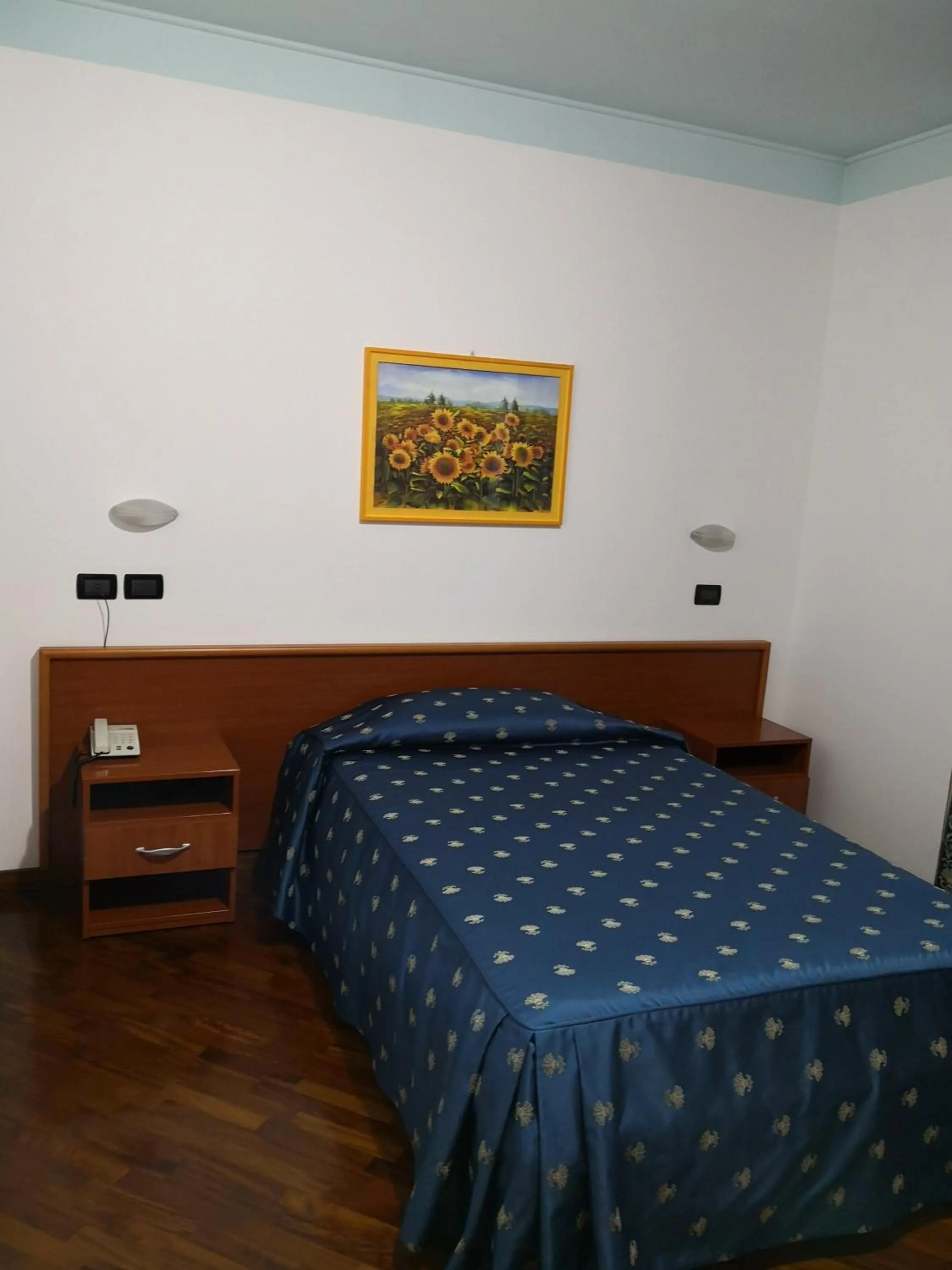 Bed in Hotel La Cantina