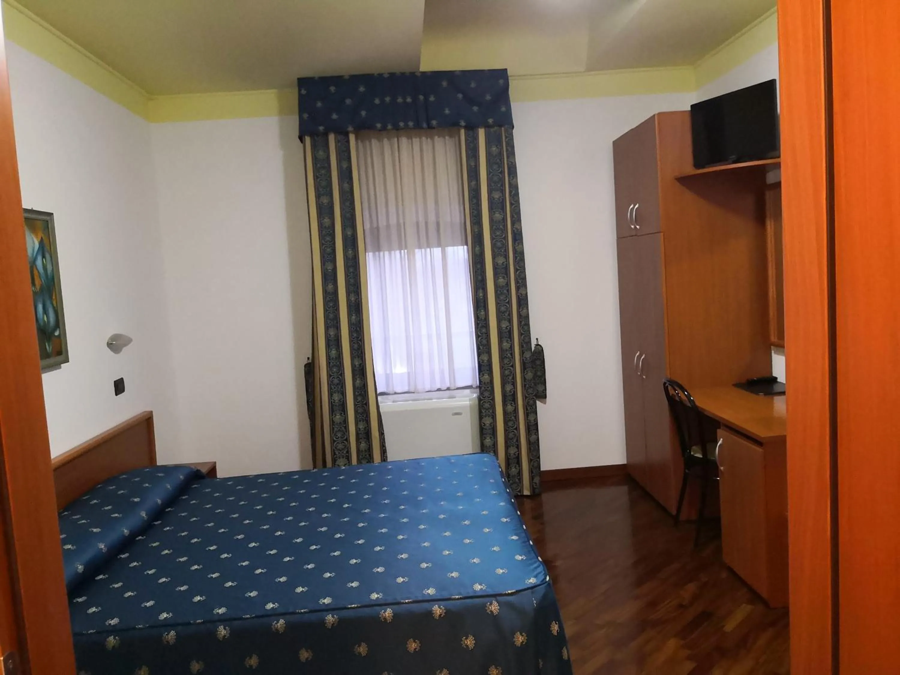 Bed in Hotel La Cantina