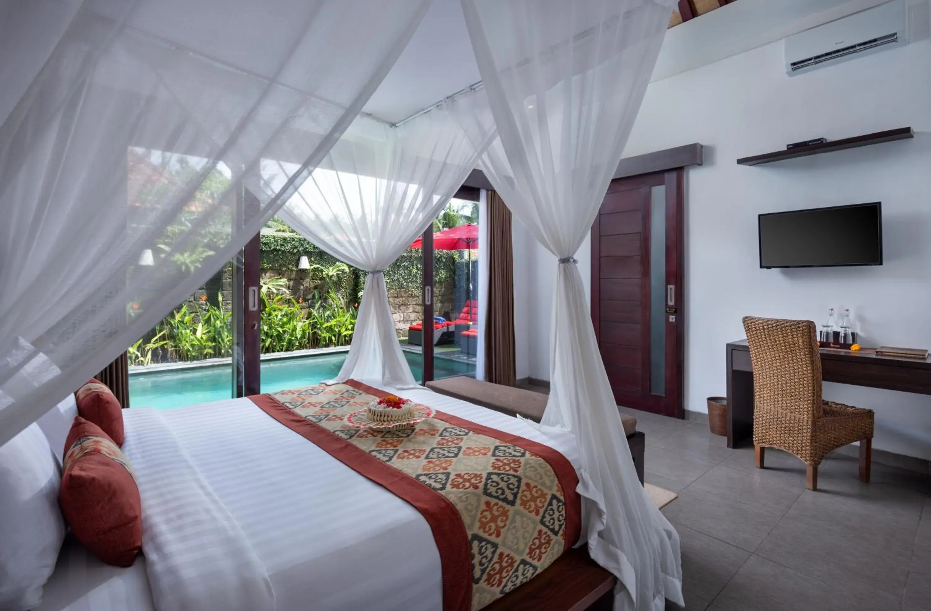 Communal lounge/ TV room, Bed in Griya Shanti Villas & Spa Communal lounge/ TV room, Bed in Griya Shanti Villas & Spa