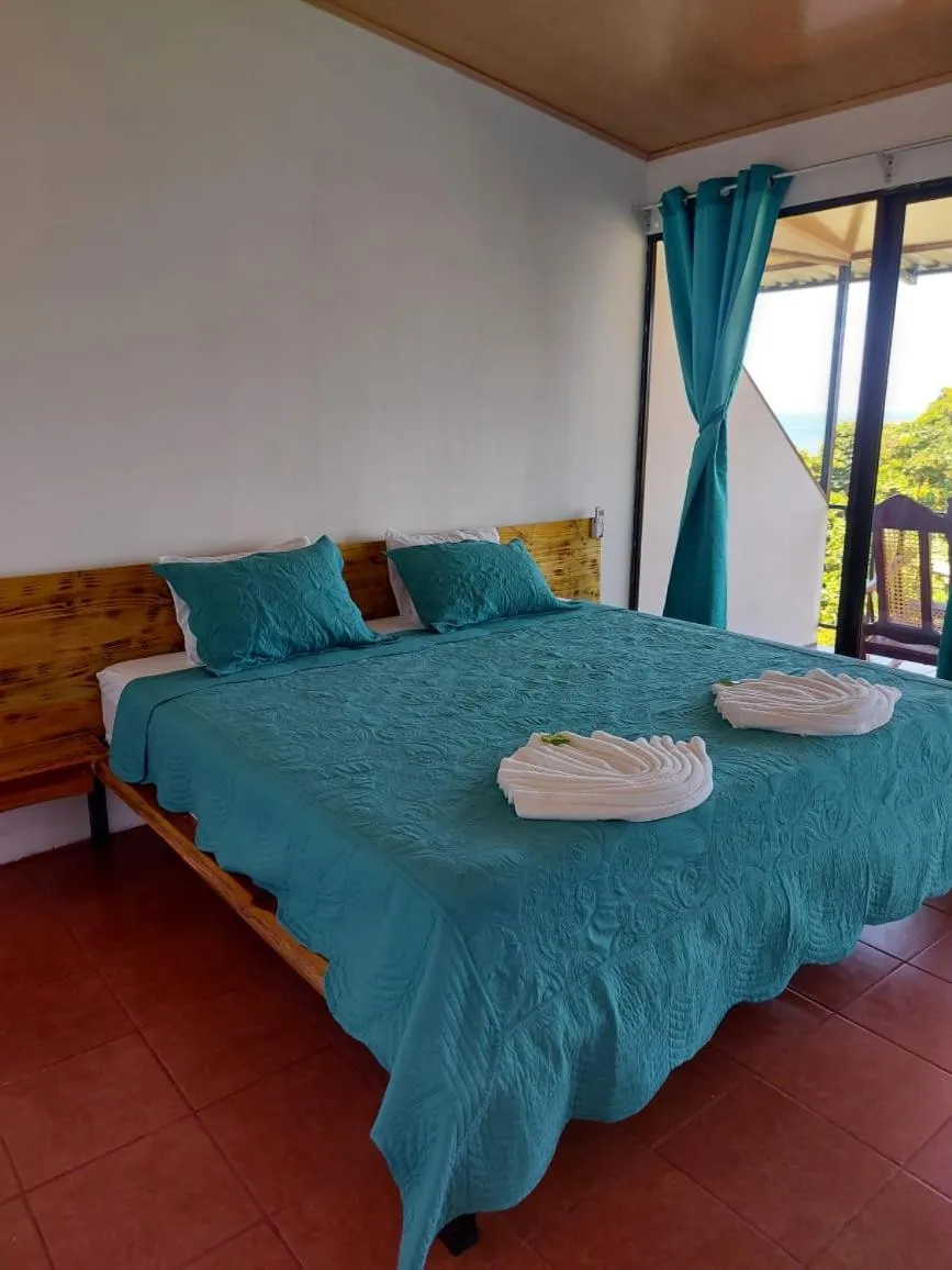 Bed in Hotel Cabinas Murillo