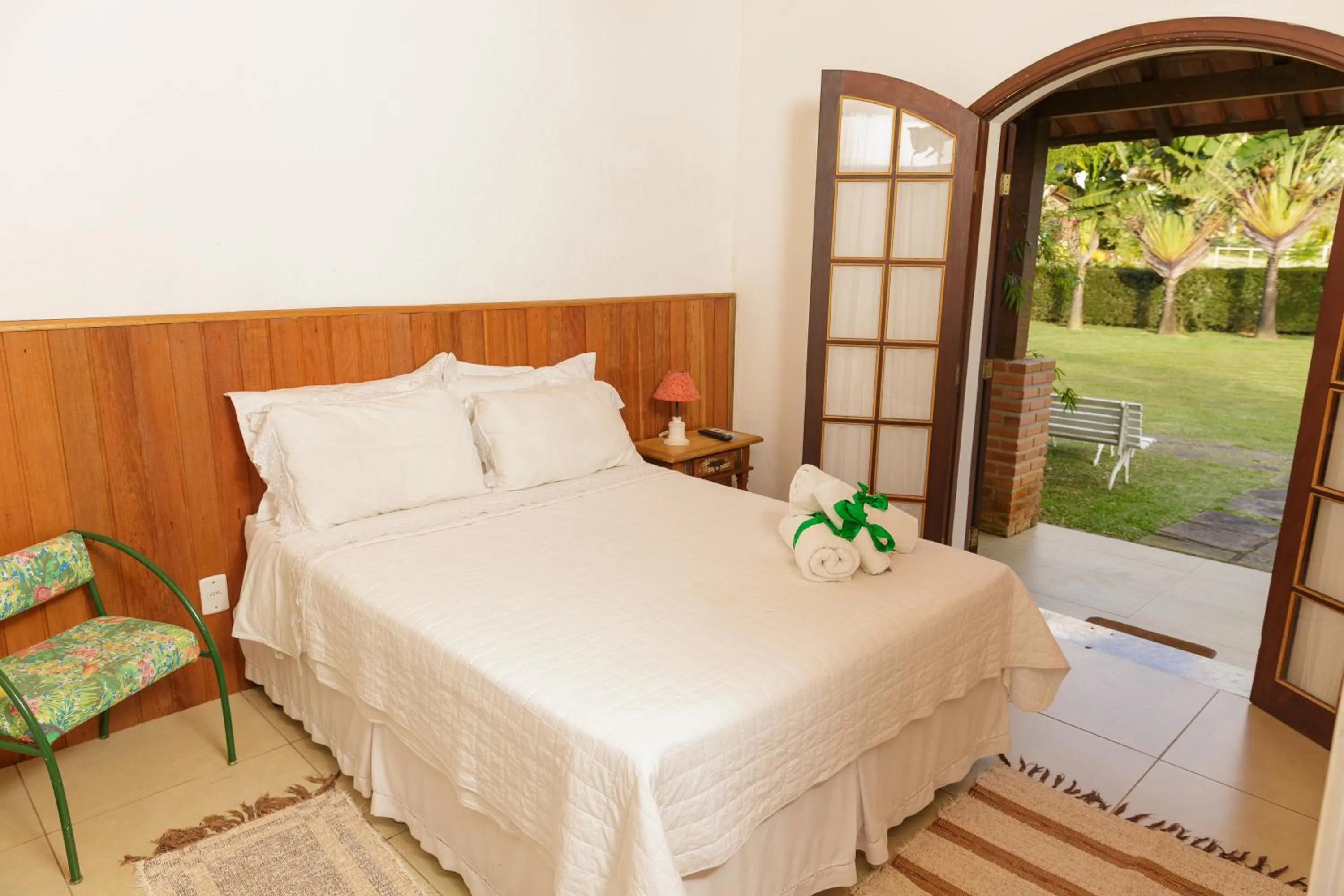 Bed in Pousada das Bromélias