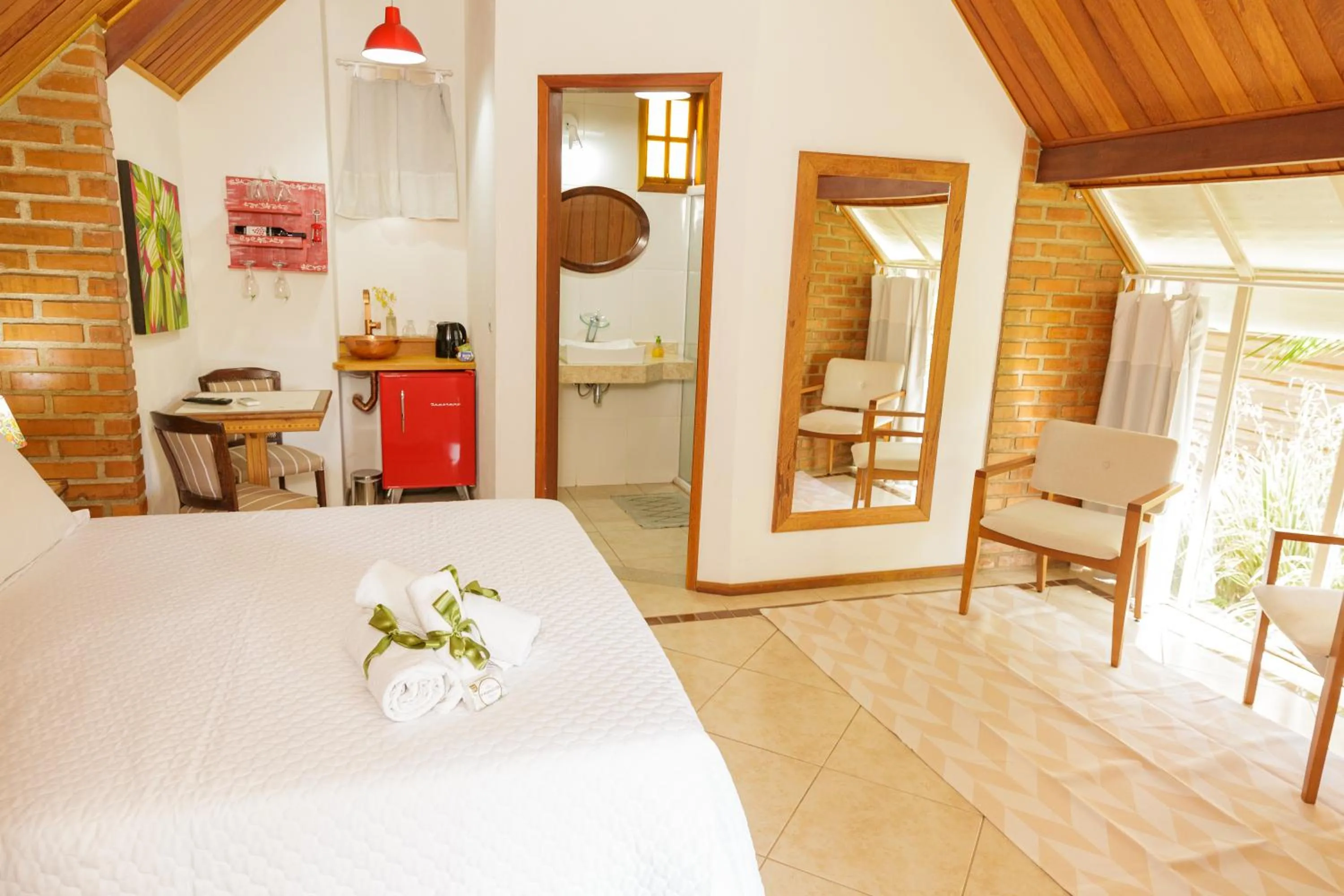 Bed in Pousada das Bromélias