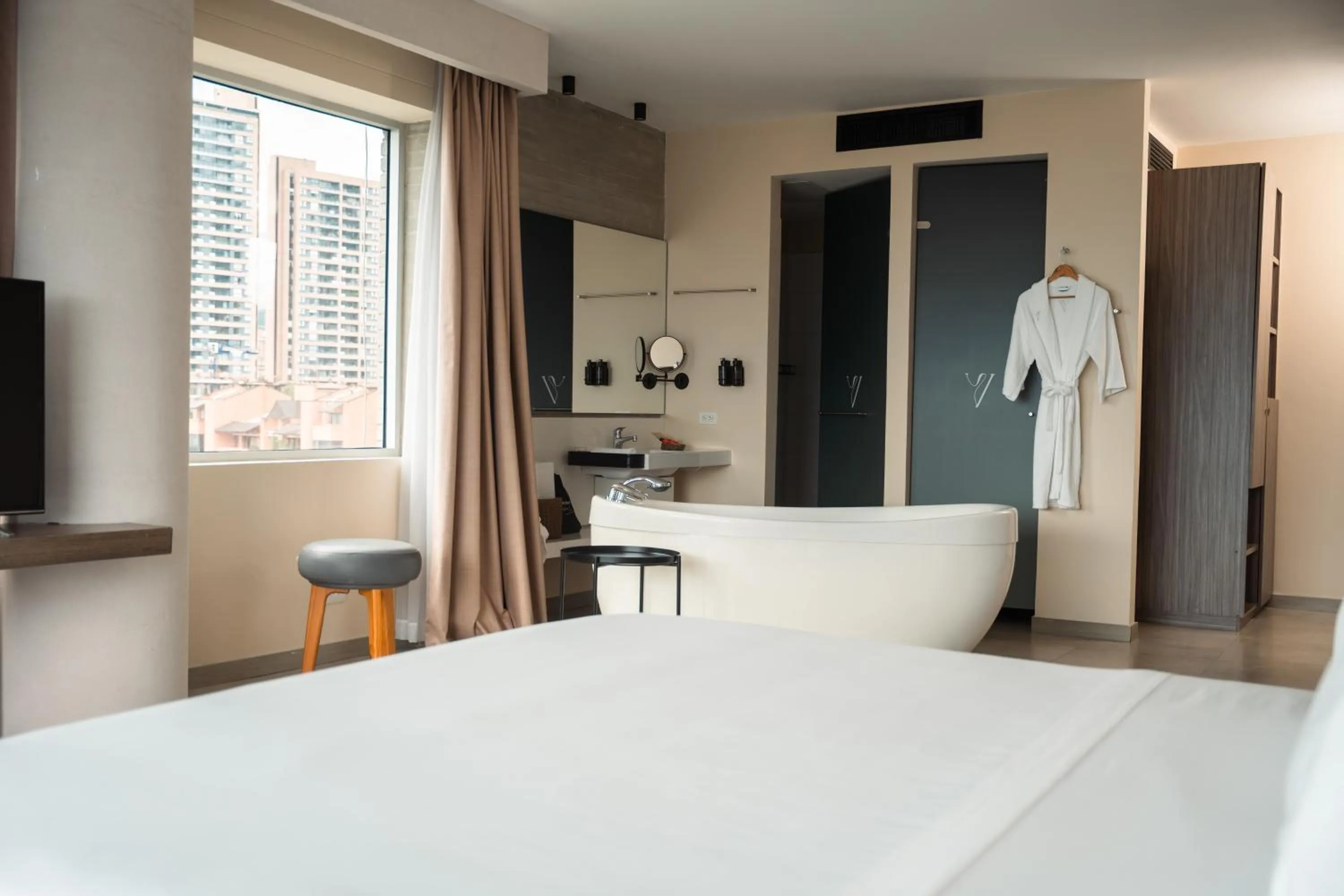 Bathroom, Bed in V Grand Hotel, a member of Radisson Individuals