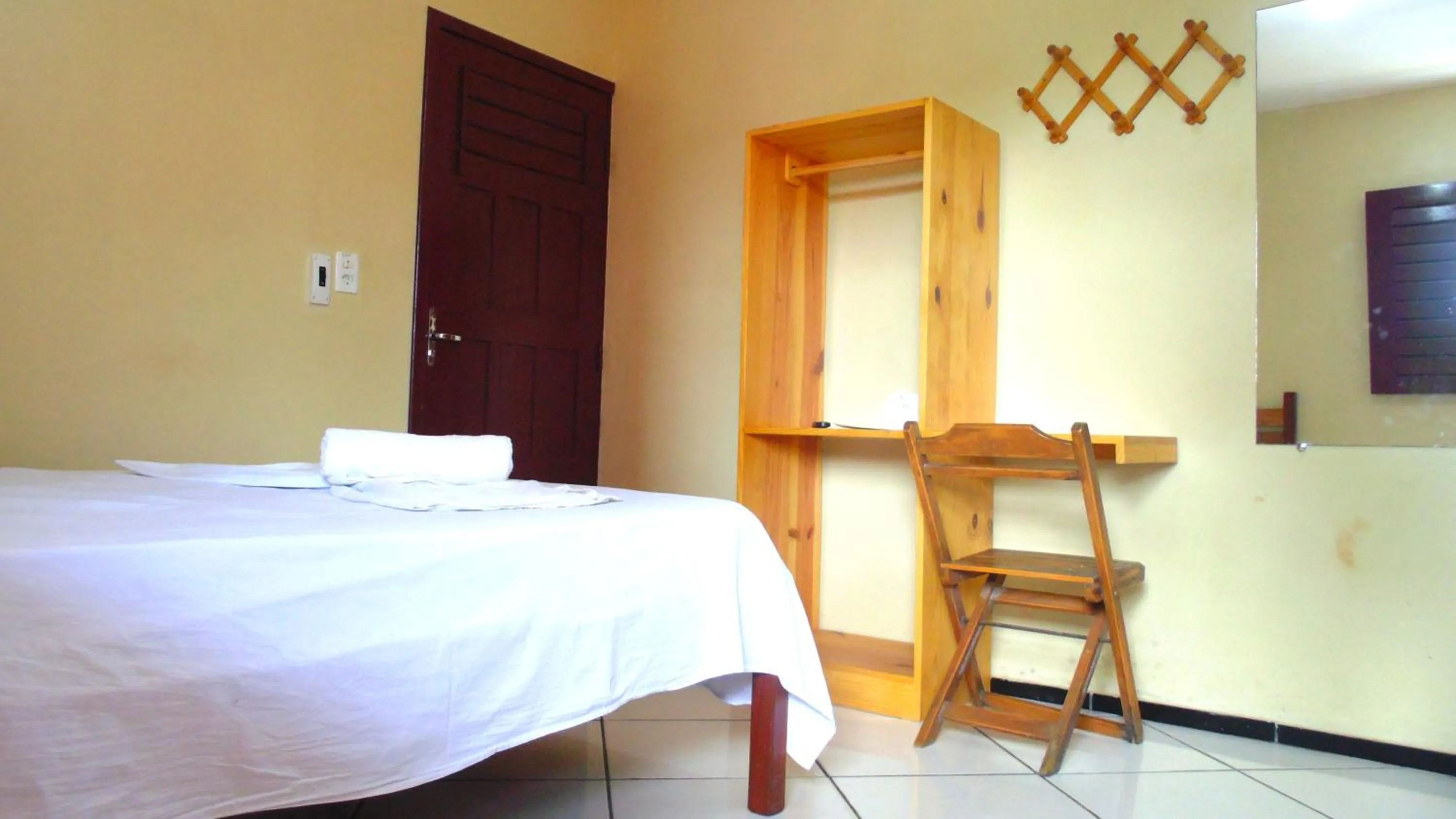 Bed in Pousada Vital