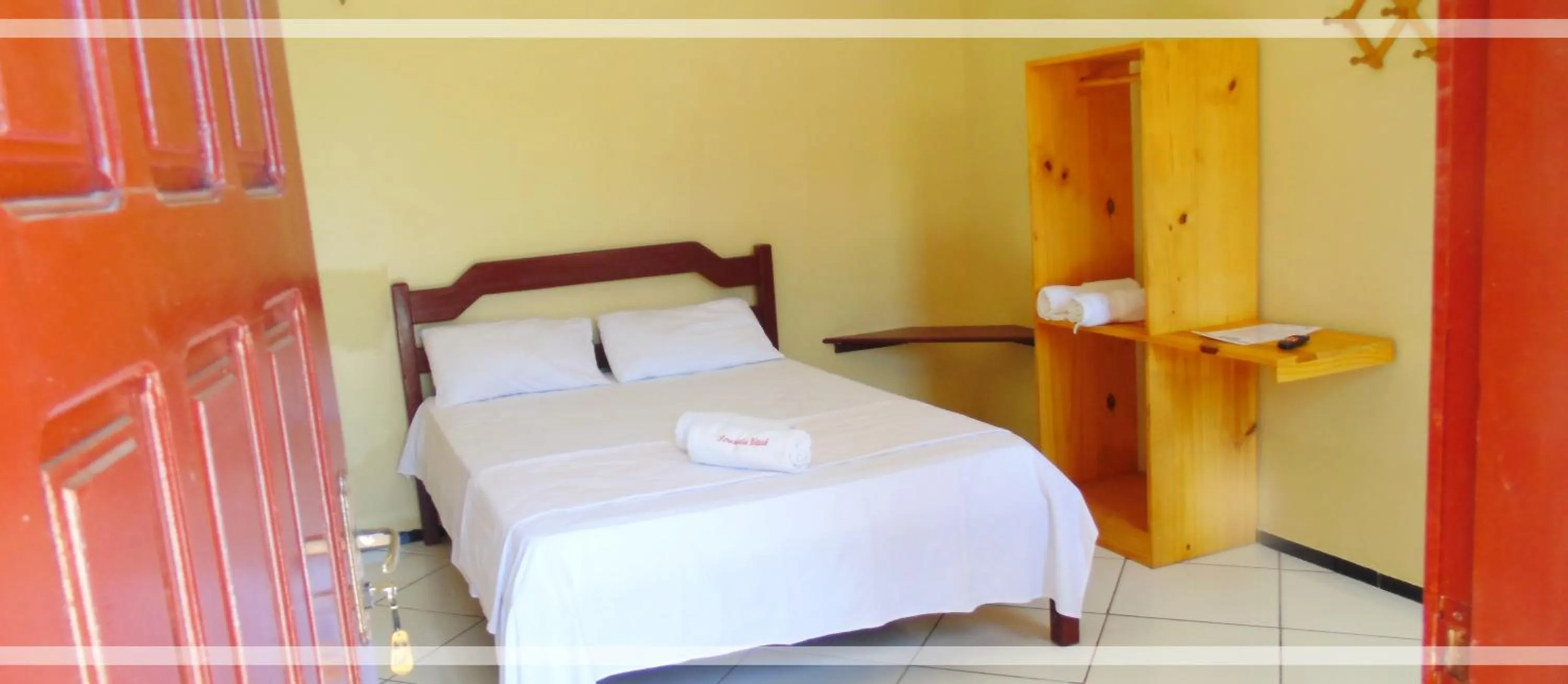 Bed in Pousada Vital