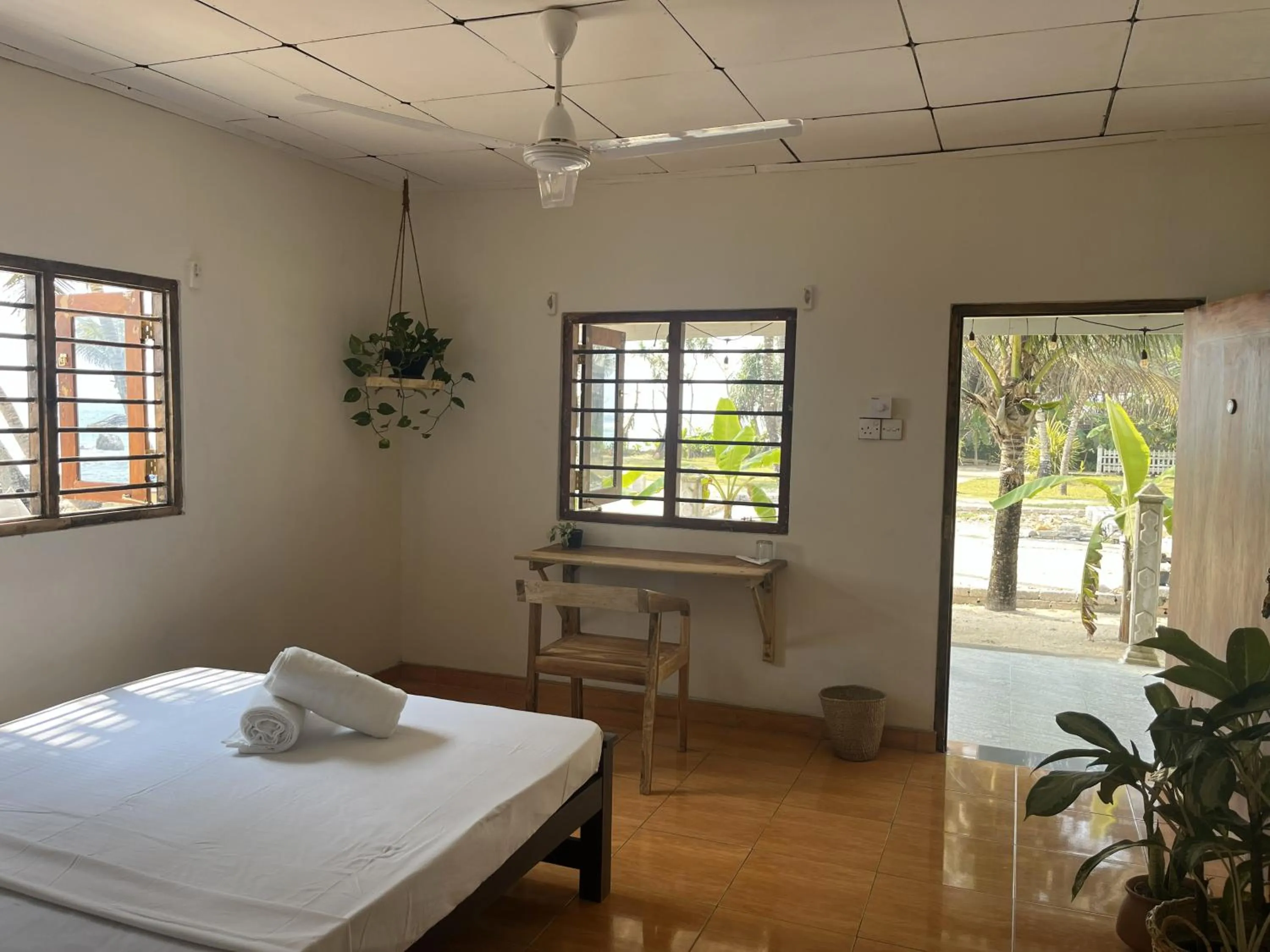 Photo of the whole room, Bed in Surfescape Sri Lanka