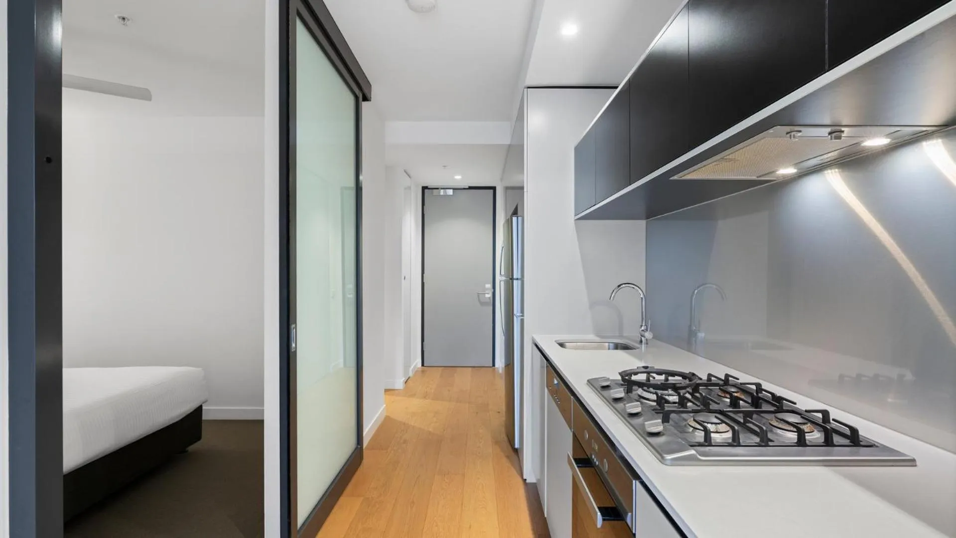 Kitchen or kitchenette in District Apartments Fitzroy