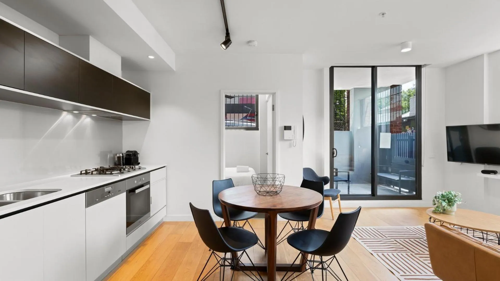 Kitchen or kitchenette in District Apartments Fitzroy