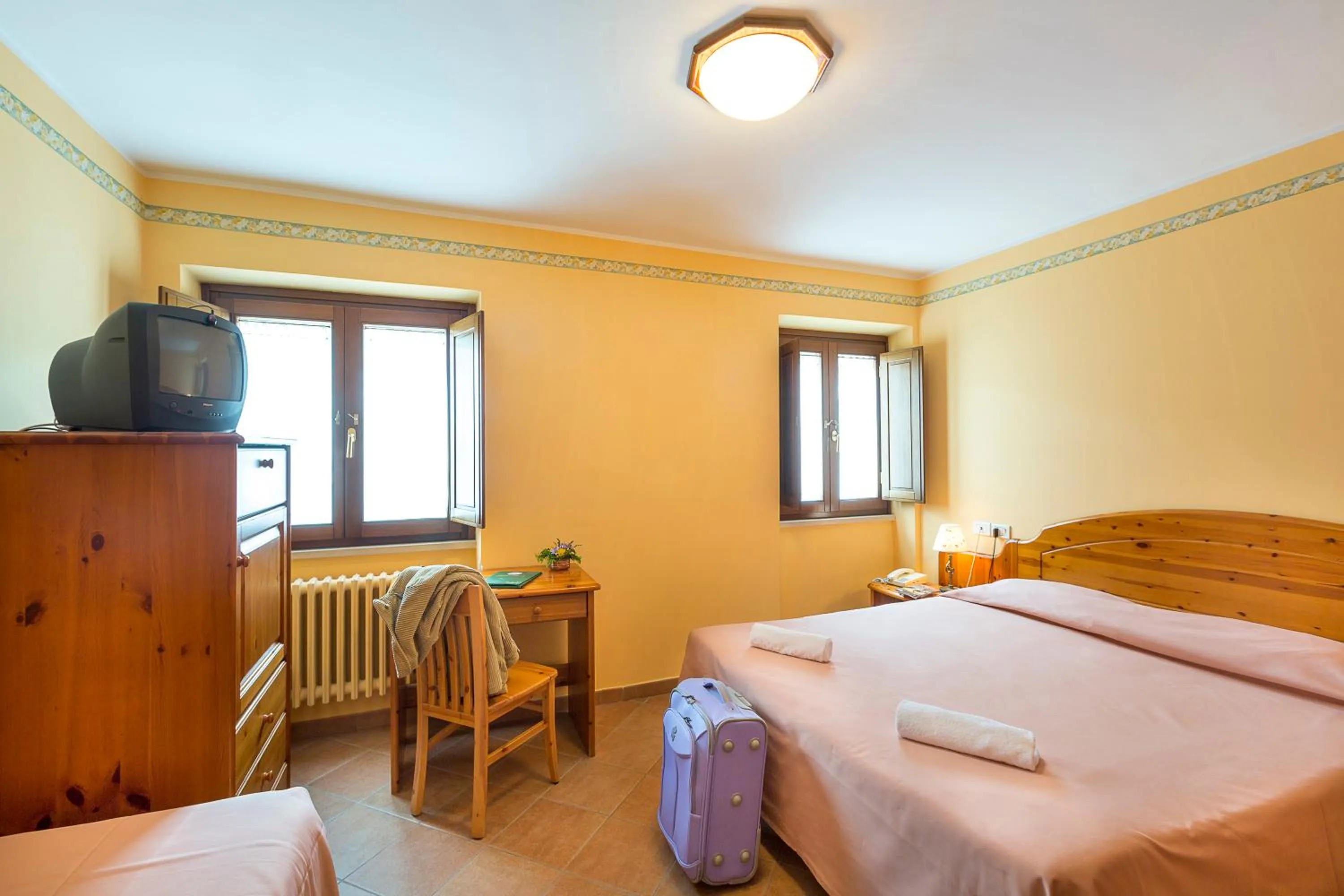 Photo of the whole room, Bed in Hotel Trieste