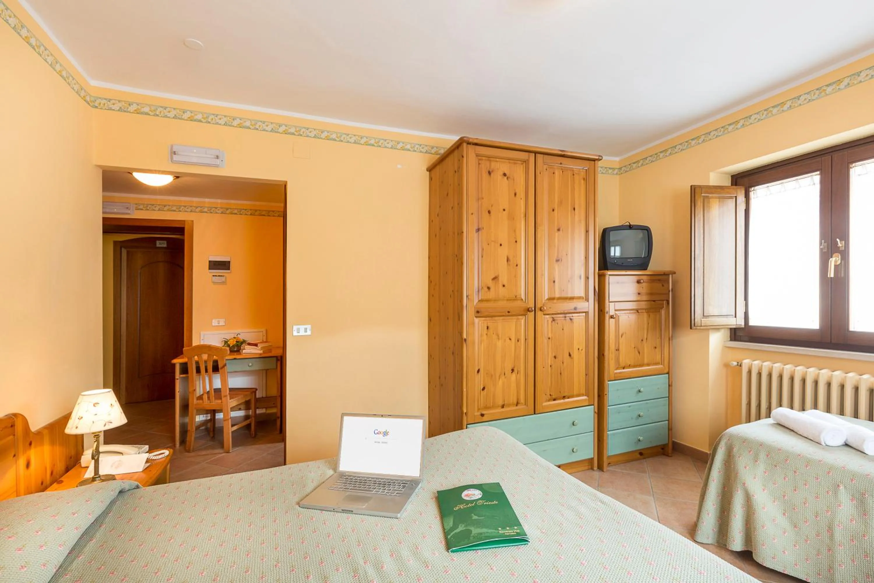 Photo of the whole room, Bed in Hotel Trieste