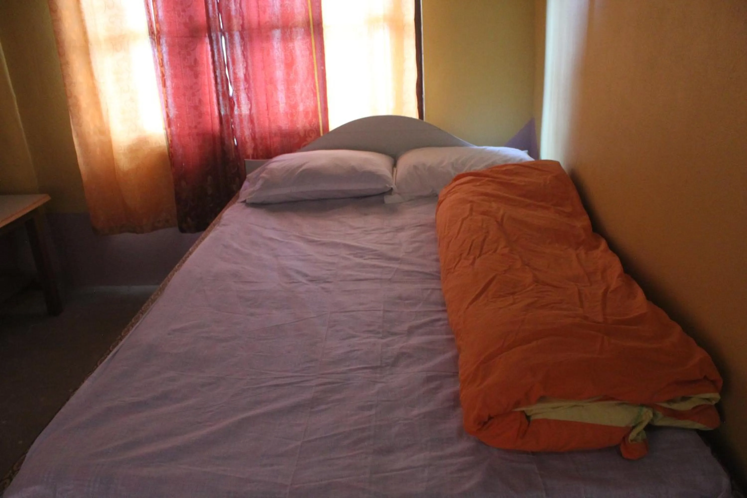Bed in Shanta Ghar A Rustic Guesthouse