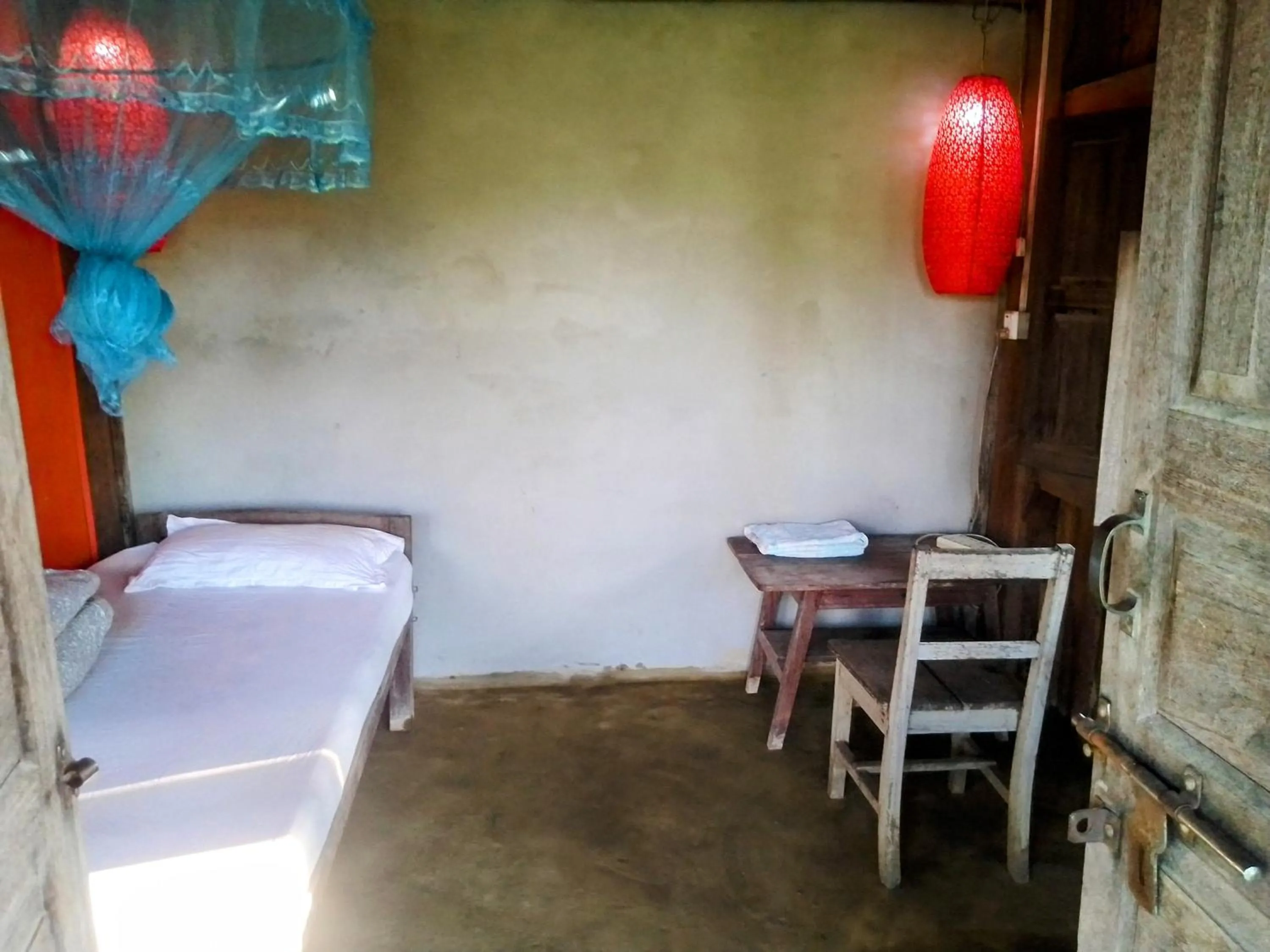 Bed in Shanta Ghar A Rustic Guesthouse