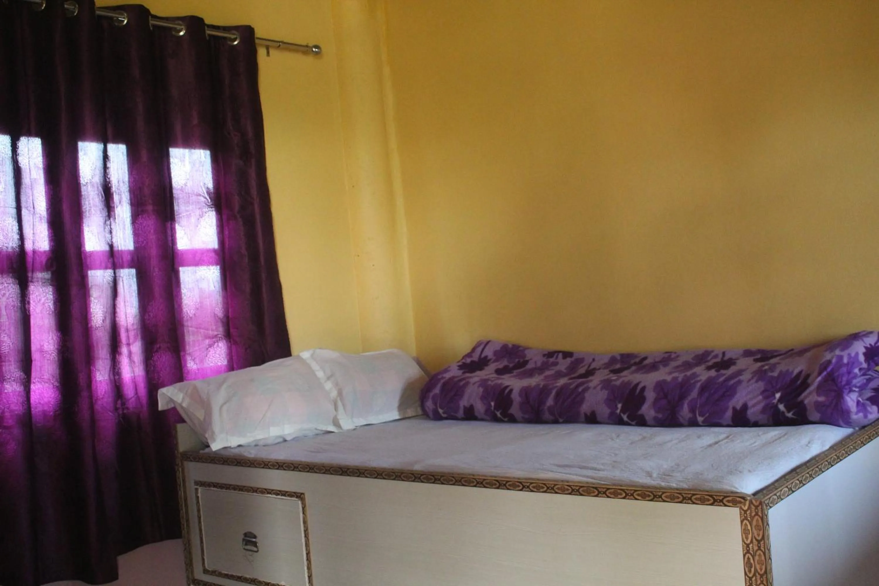 Bed in Shanta Ghar A Rustic Guesthouse
