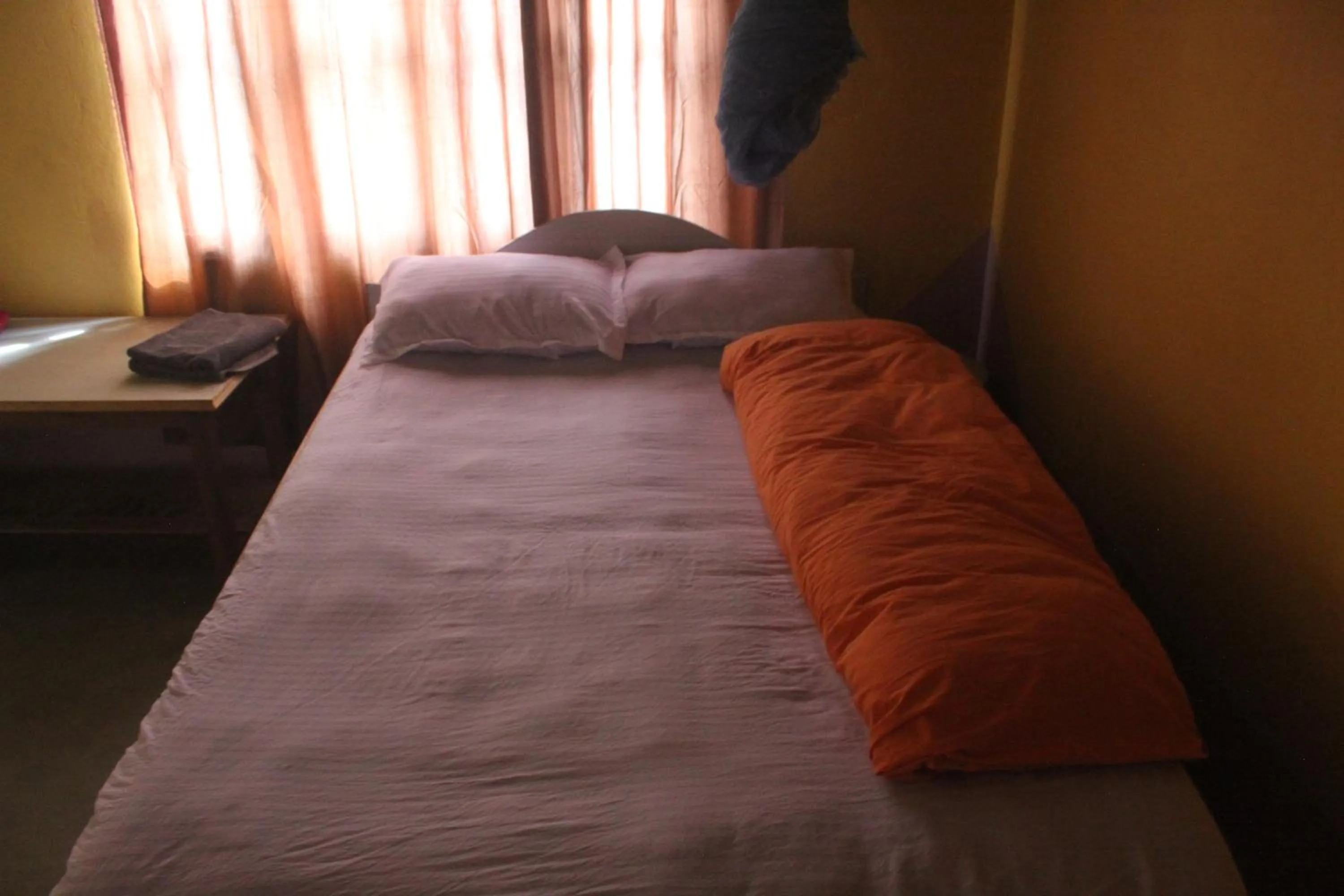 Bed in Shanta Ghar A Rustic Guesthouse