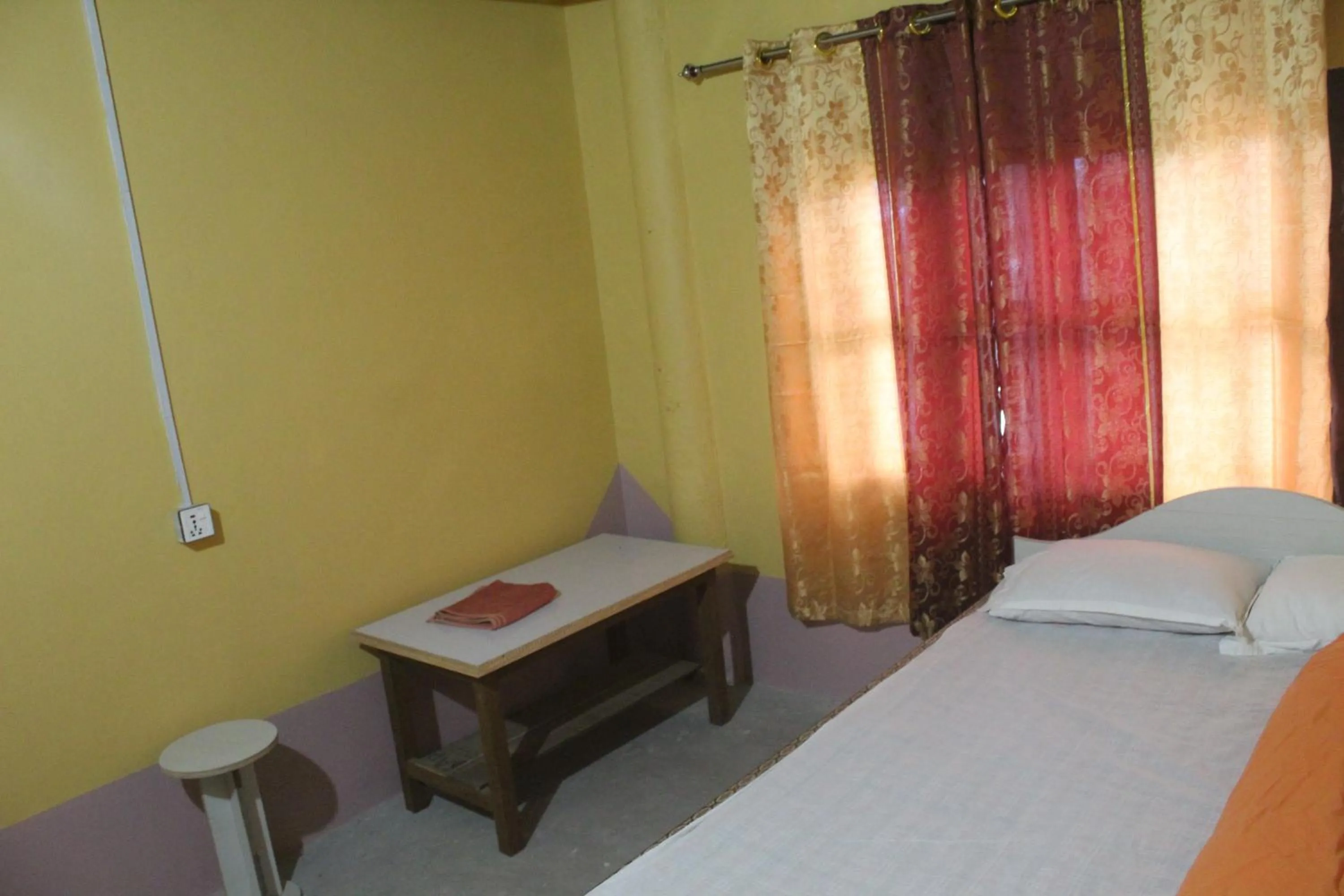 Bed in Shanta Ghar A Rustic Guesthouse