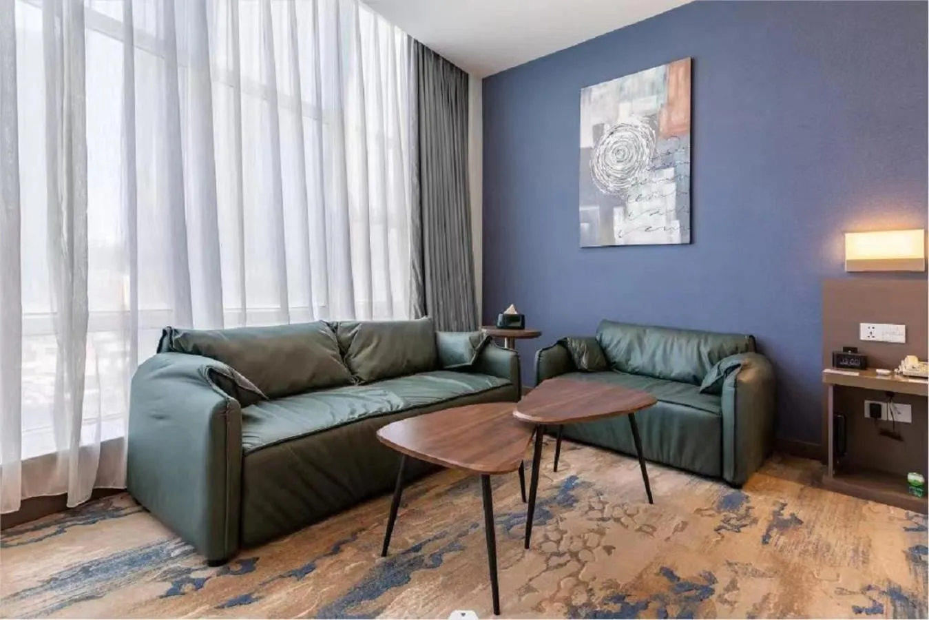 Seating area in Holiday Inn Express Shenyang North Station by IHG