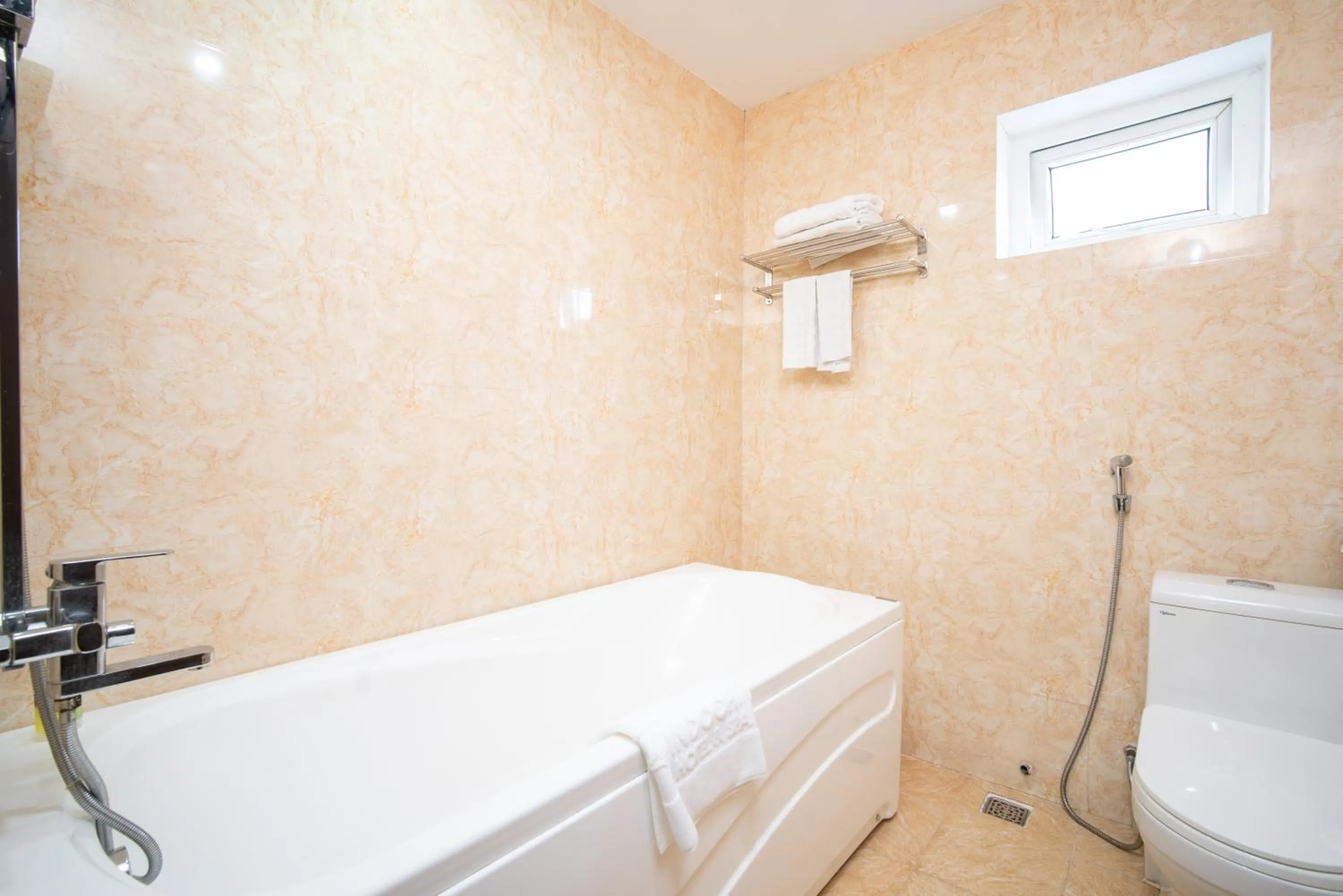 Bath in Me Q Beach Hotel