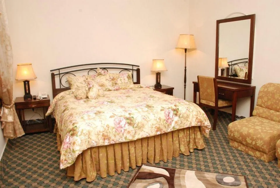 Photo of the whole room, Bed in Savoy Inn Guest House Islamabad