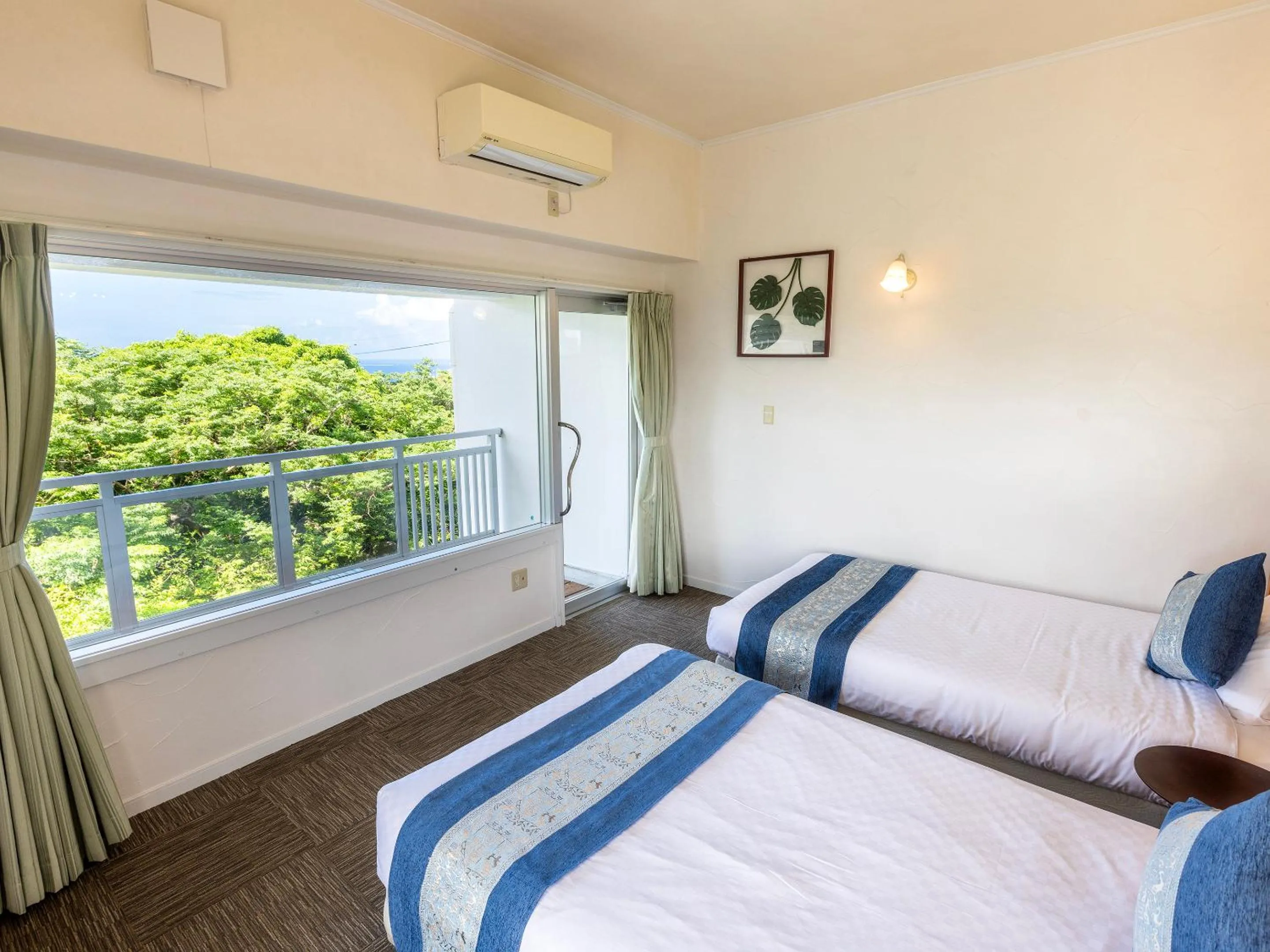 Photo of the whole room, Bed in Hoshi No Terrace Motobu Yamazato