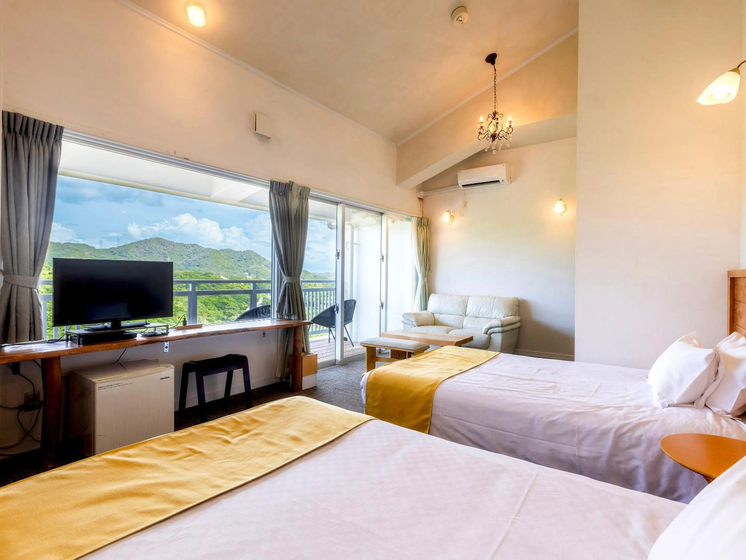 Photo of the whole room, Bed in Hoshi No Terrace Motobu Yamazato