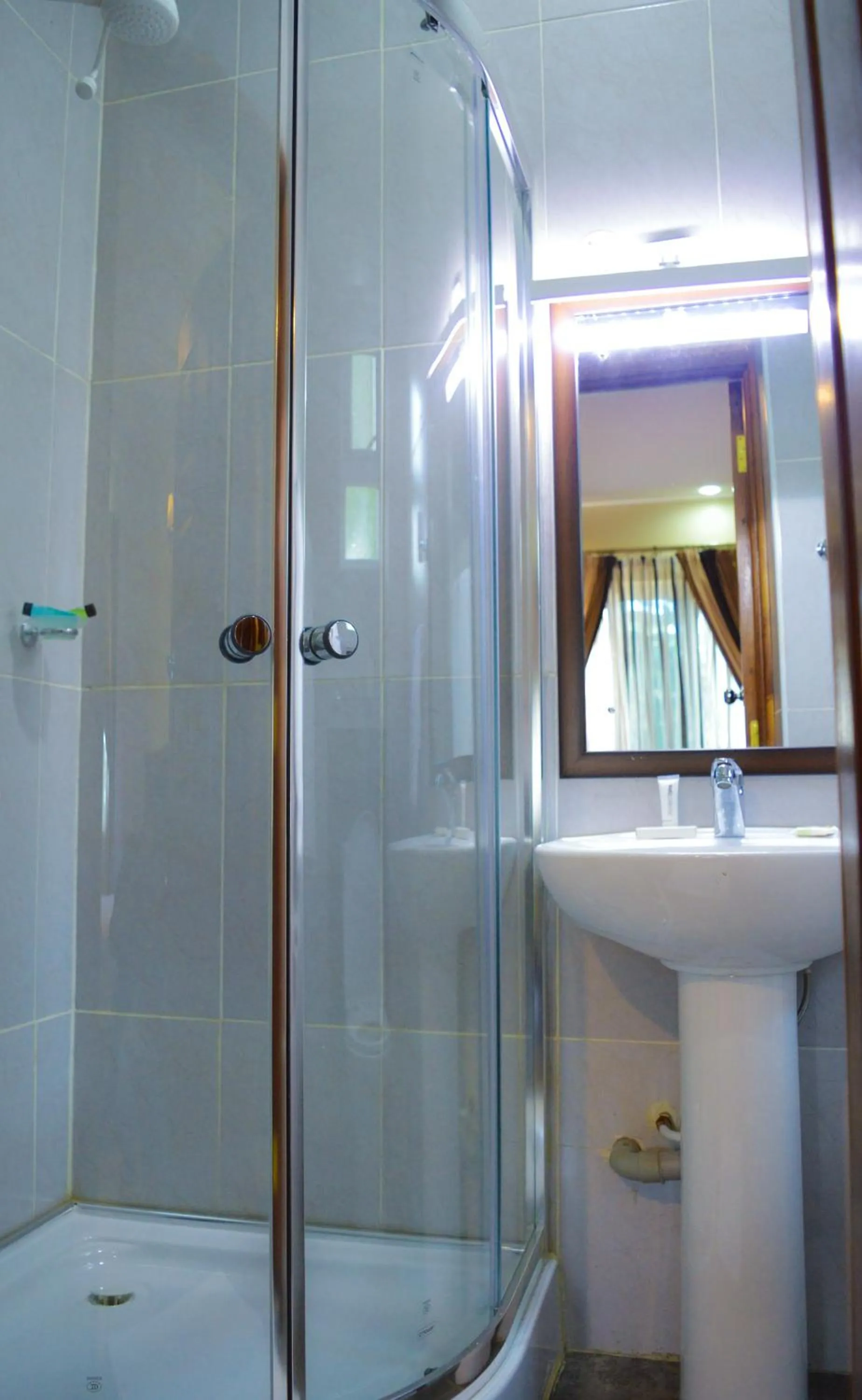 Bathroom in Red Ruby Hotel