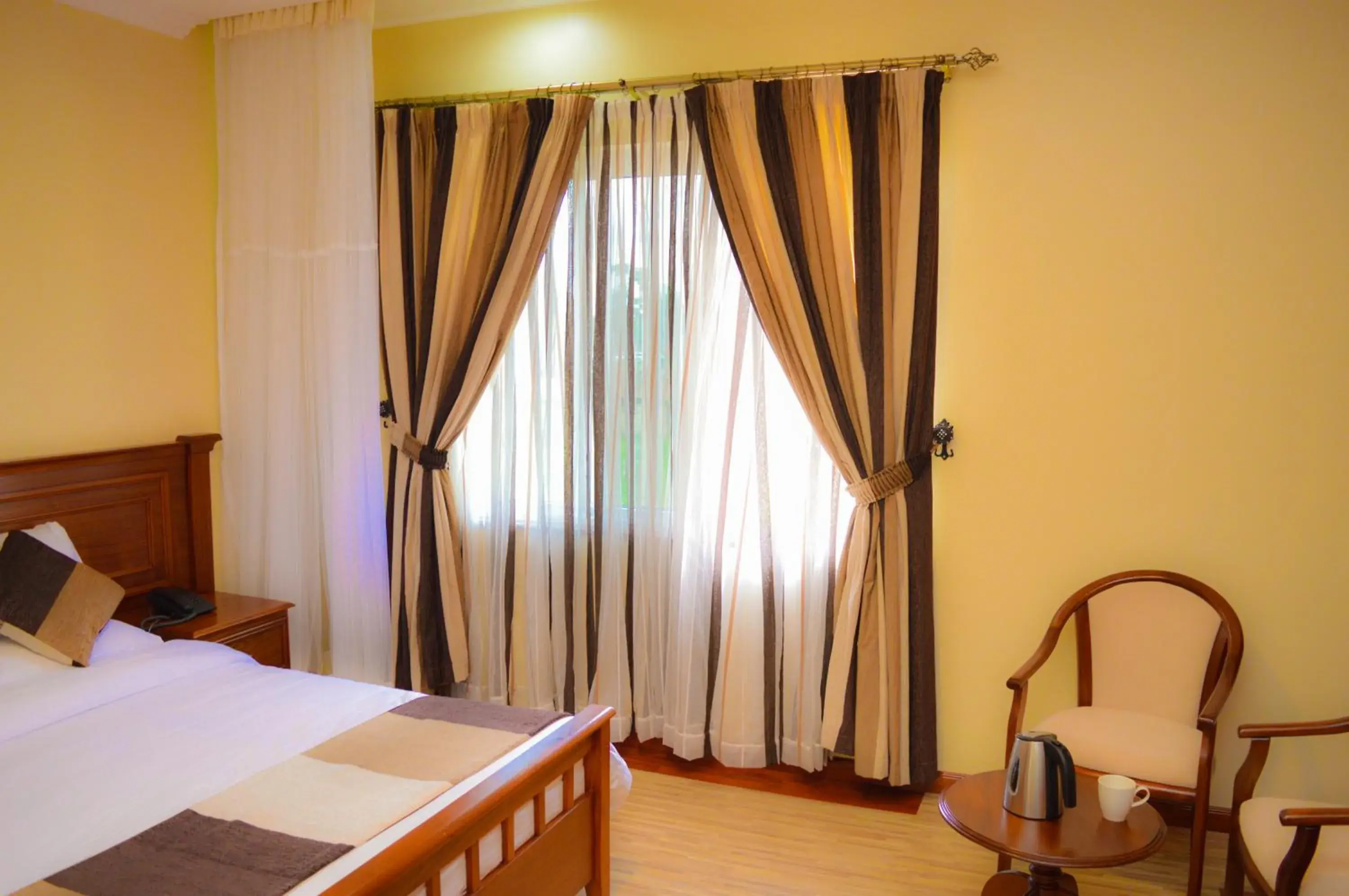 Bedroom, Bed in Red Ruby Hotel Bedroom, Bed in Red Ruby Hotel