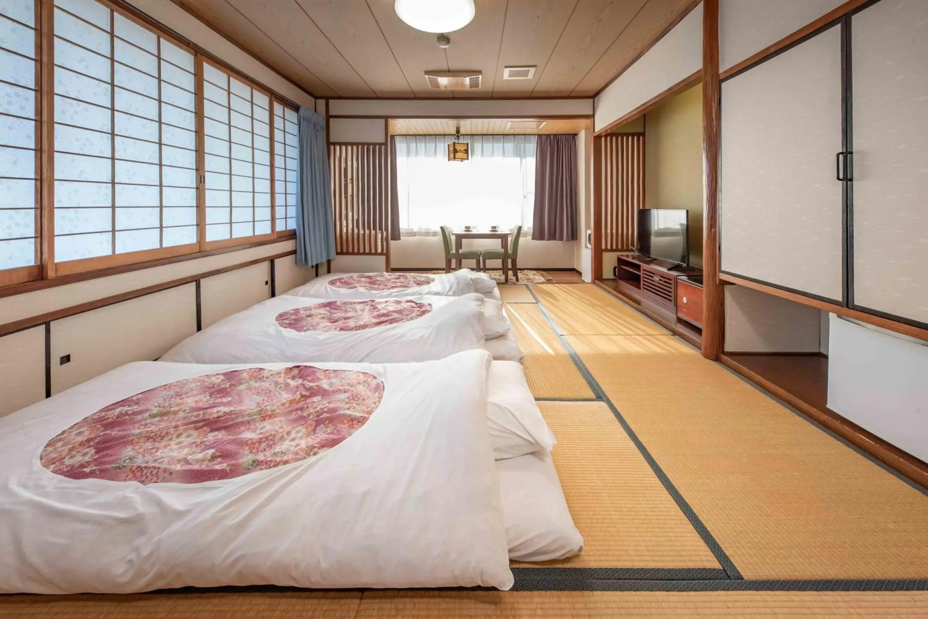 Photo of the whole room, Bed in Hotel Shin Makomo Photo of the whole room, Bed in Hotel Shin Makomo