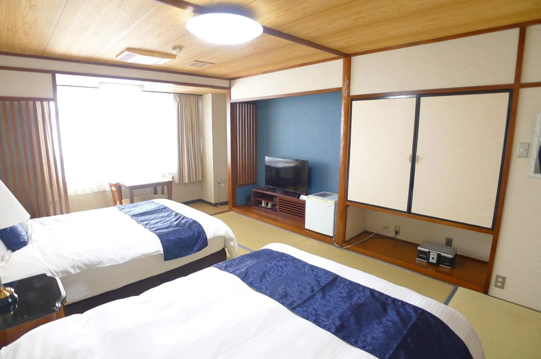 Bed in Hotel Shin Makomo