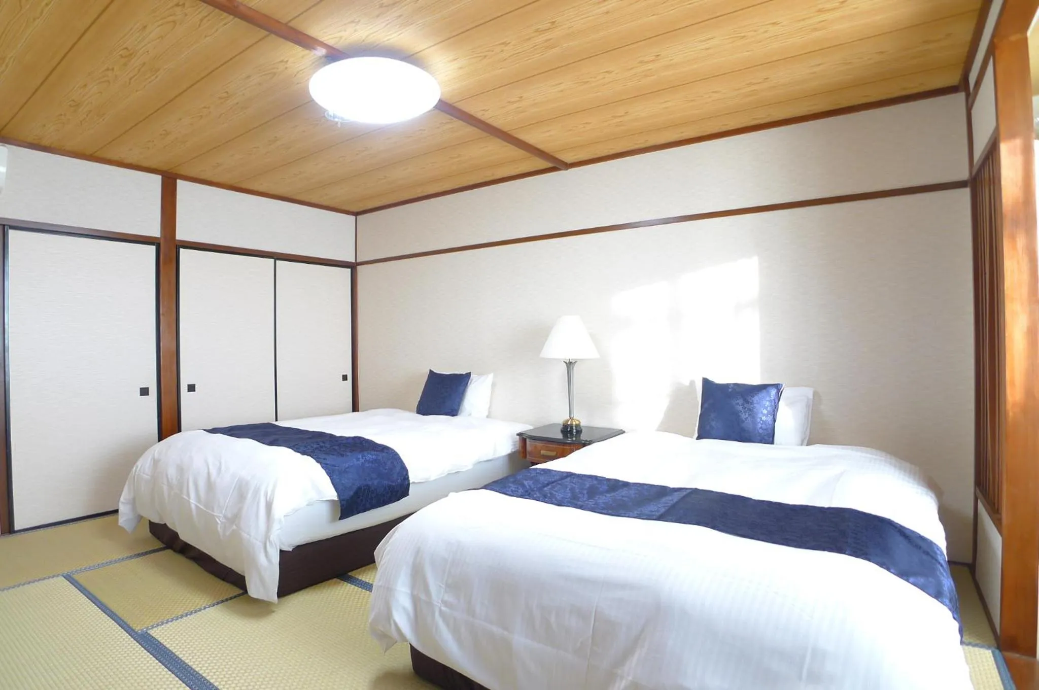 Bed in Hotel Shin Makomo