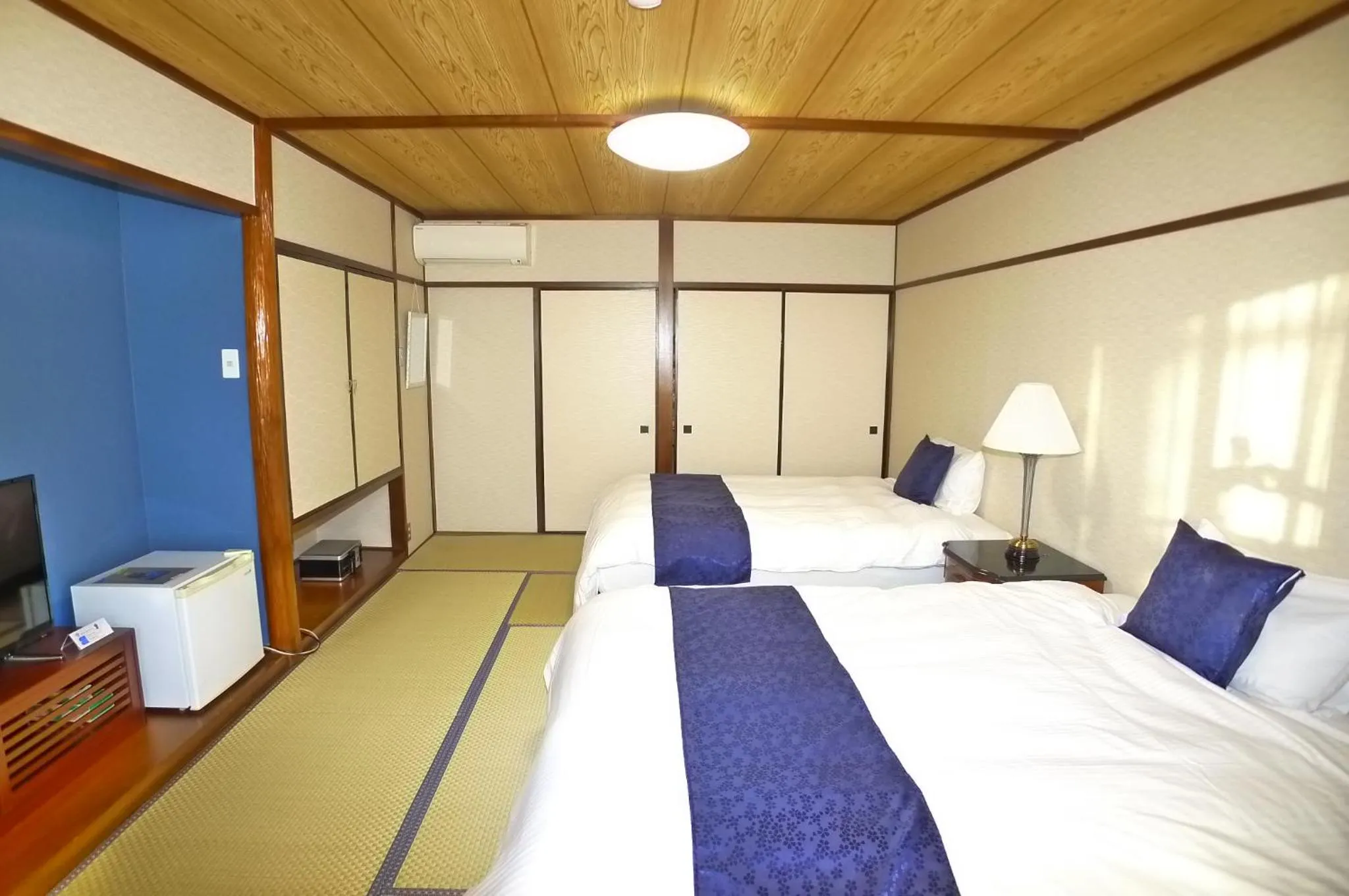 Bed in Hotel Shin Makomo