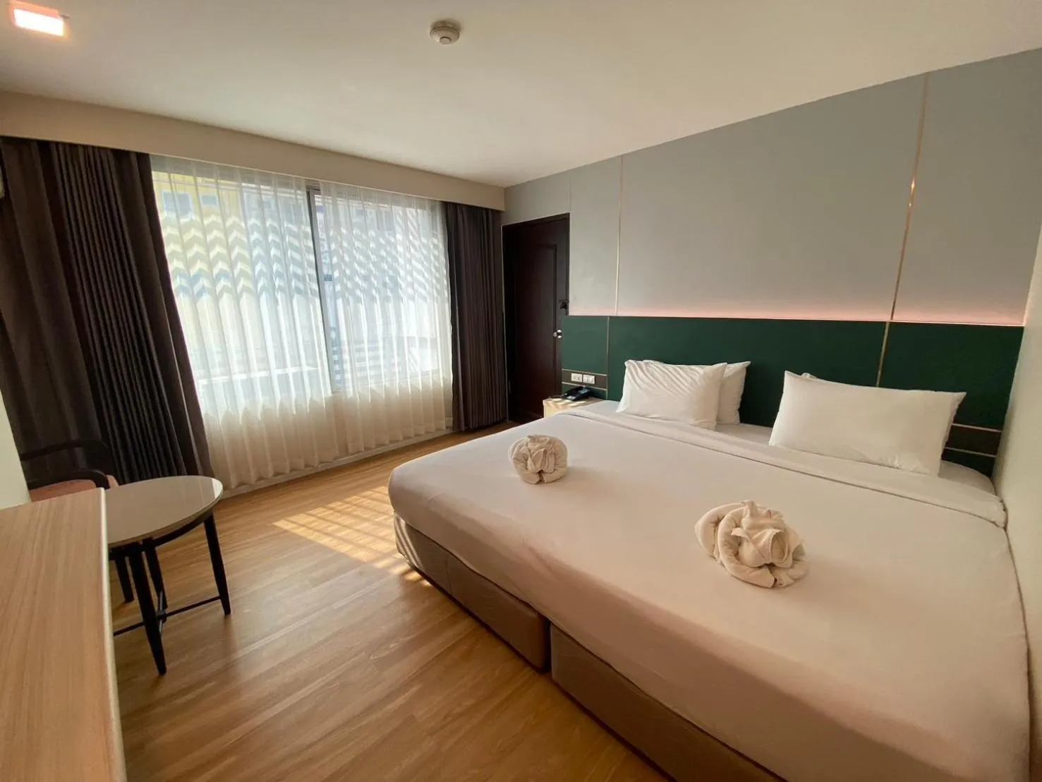 Bed in Mayflower Grande Hotel Phitsanulok