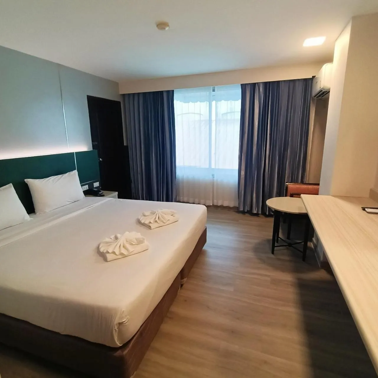 Photo of the whole room, Bed in Mayflower Grande Hotel Phitsanulok