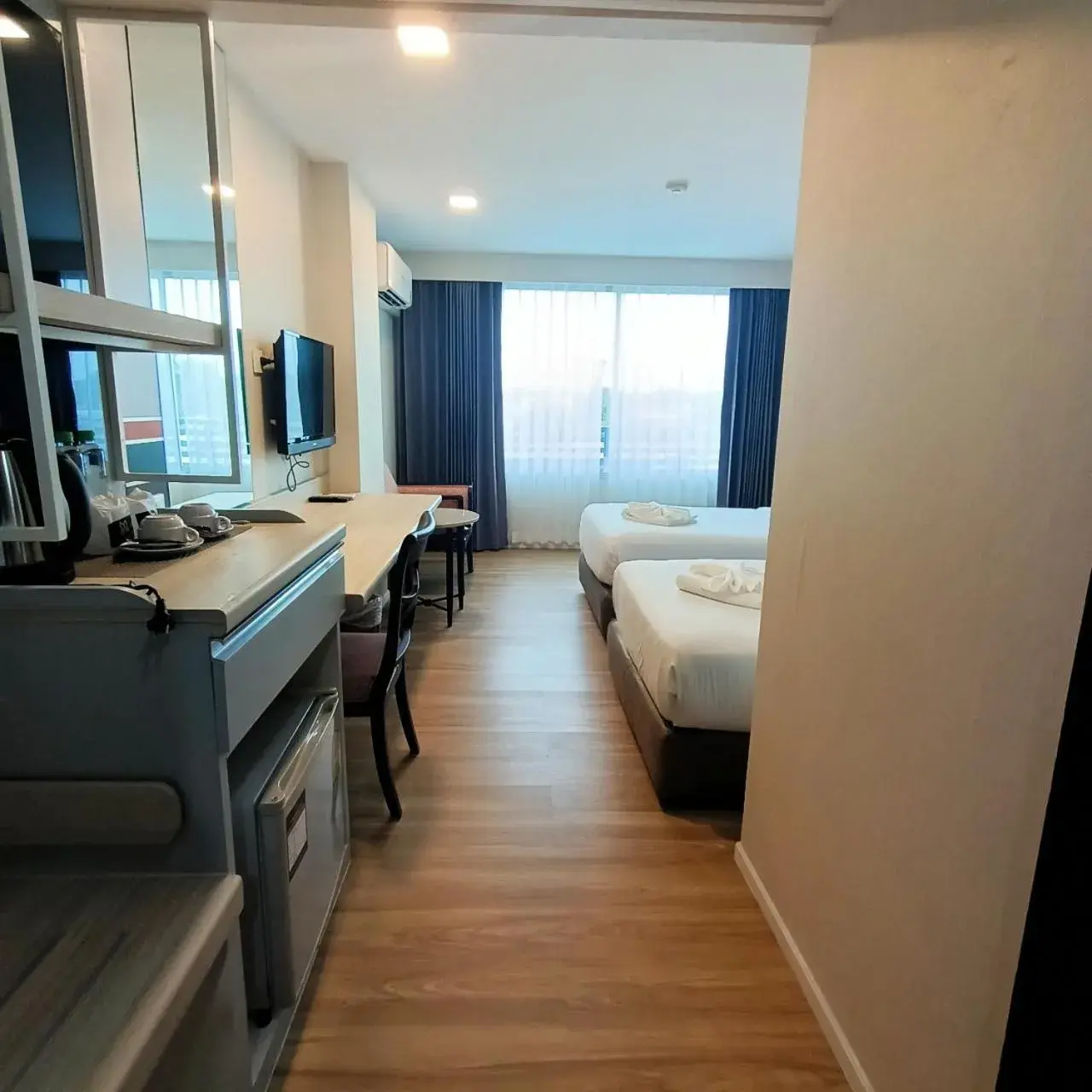 Photo of the whole room, Bed in Mayflower Grande Hotel Phitsanulok Photo of the whole room, Bed in Mayflower Grande Hotel Phitsanulok