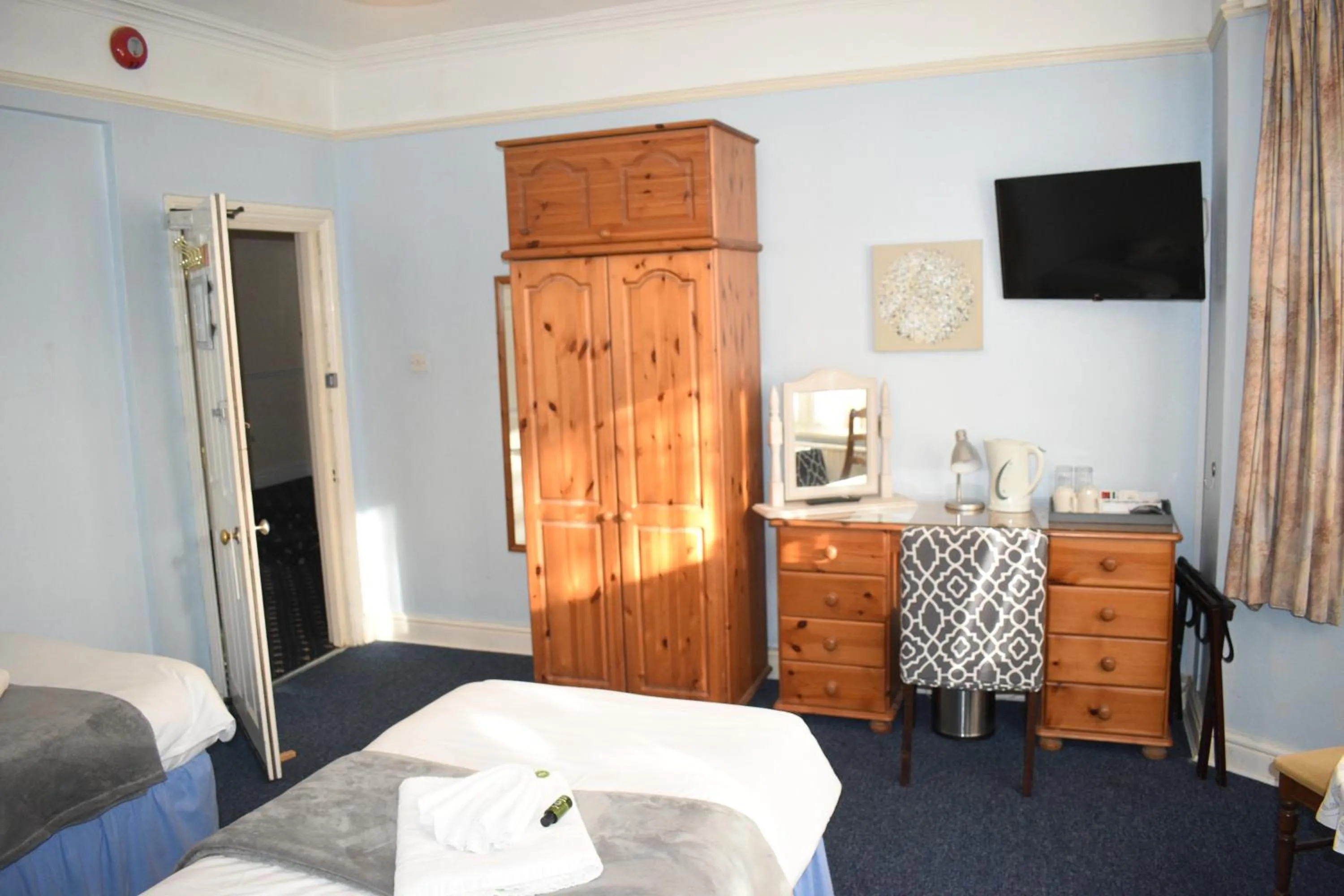 Bed in Pickwicks Guest House