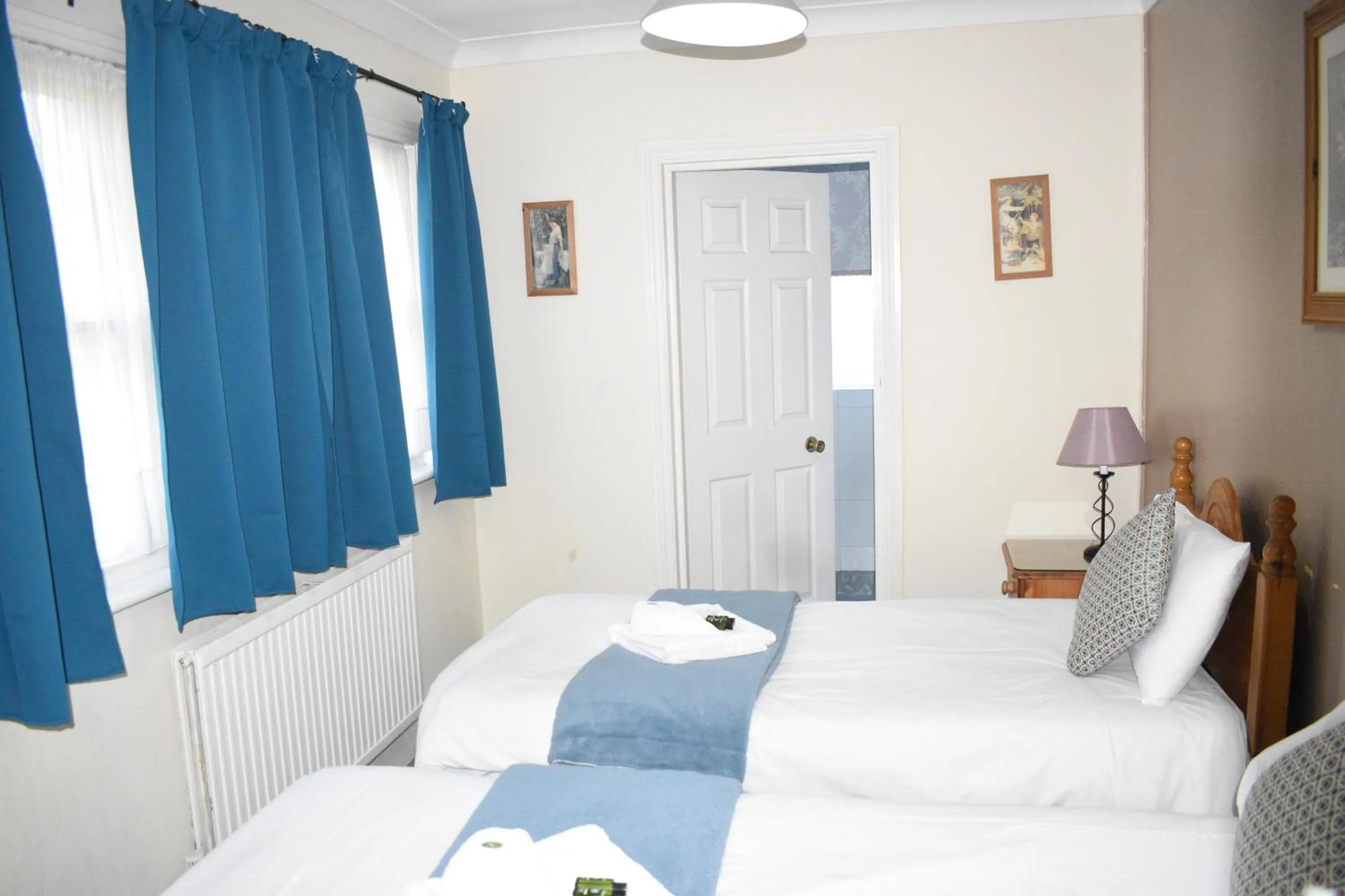 Bed in Pickwicks Guest House