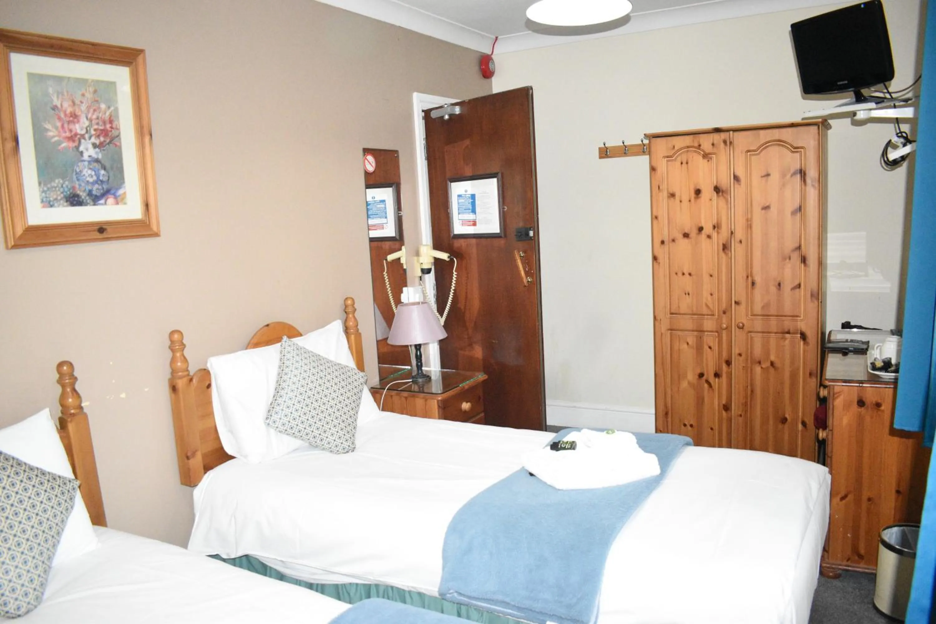 Bed in Pickwicks Guest House