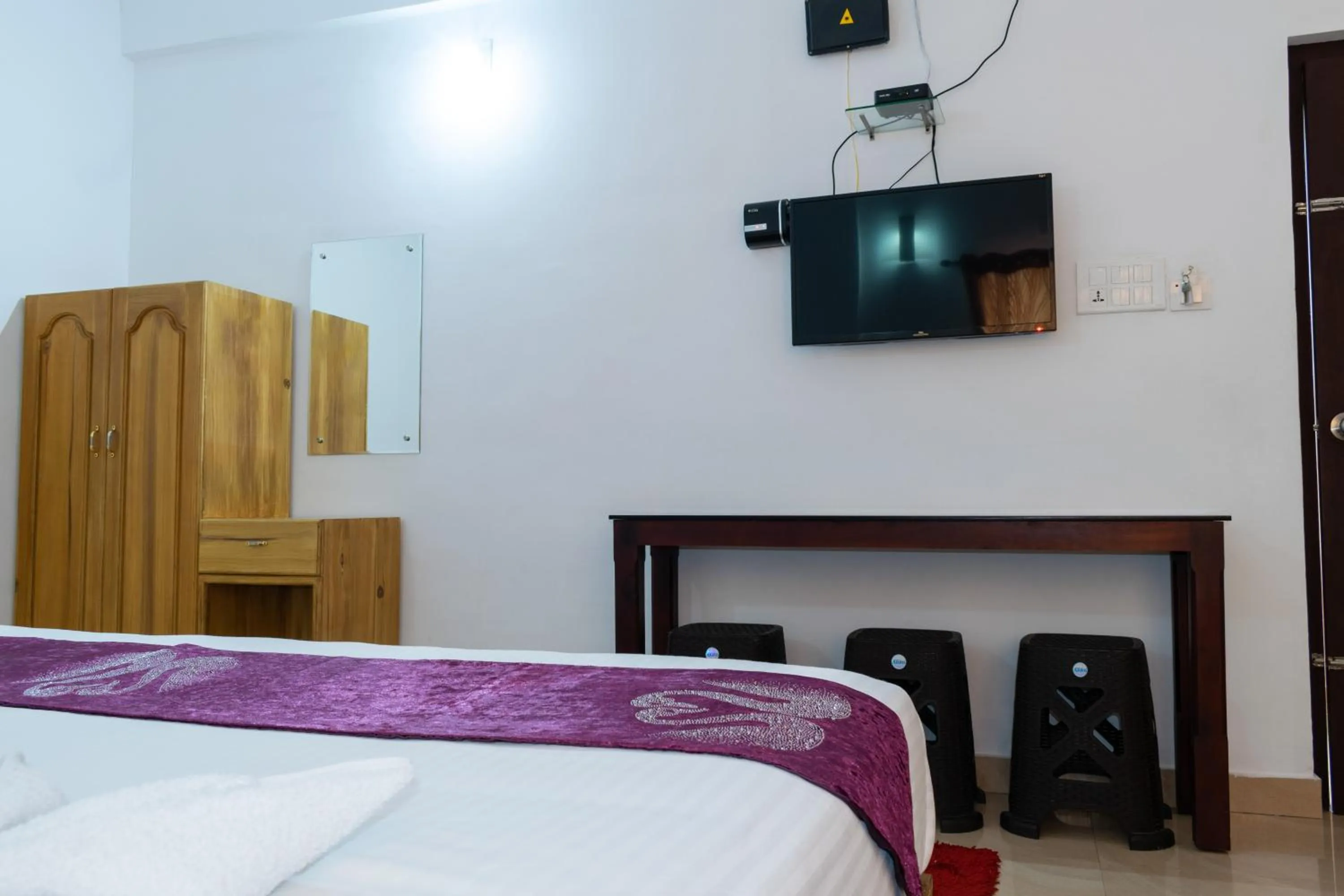 Bed in Pine Tree Munnar