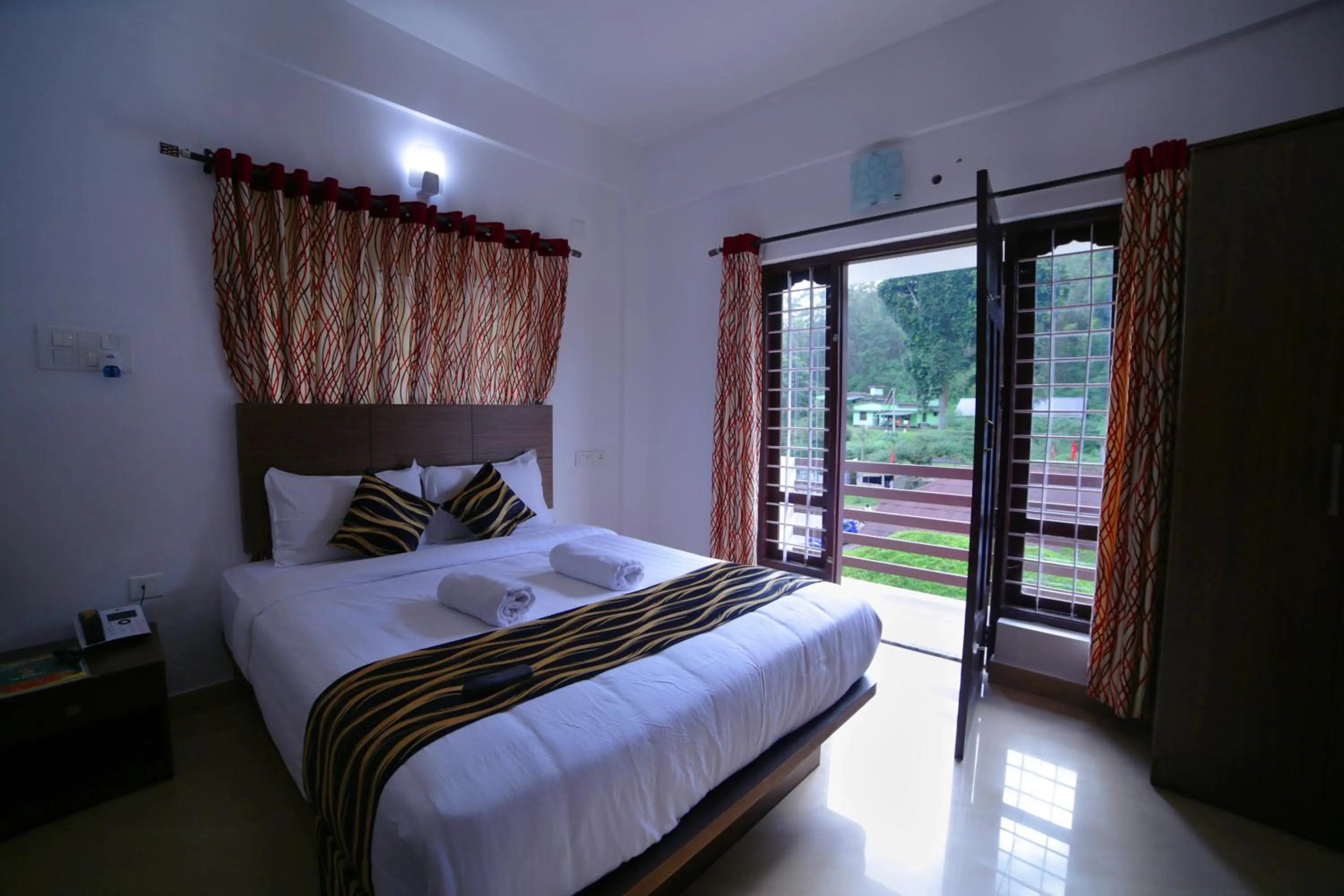 Bed in Pine Tree Munnar