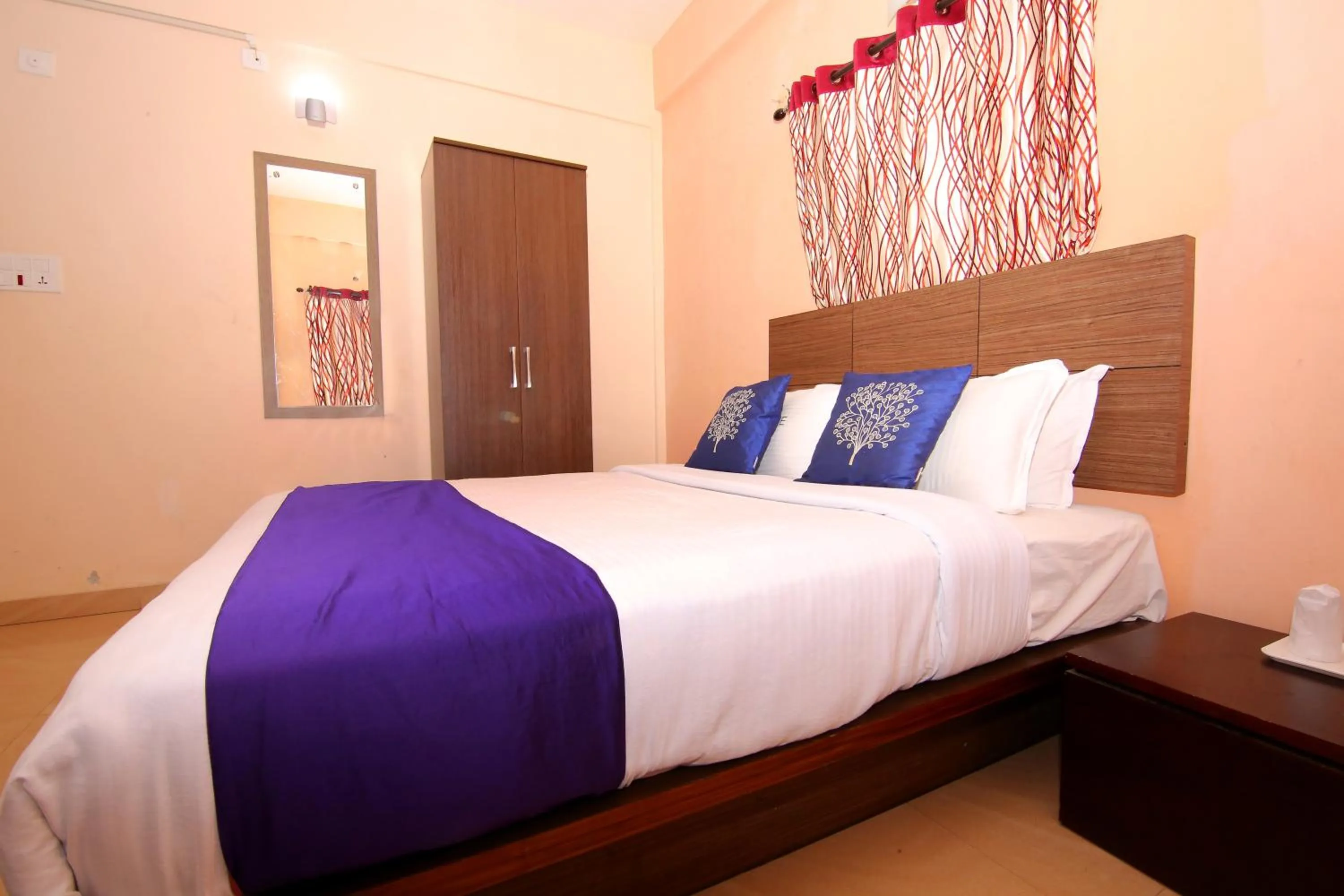 Bed in Pine Tree Munnar