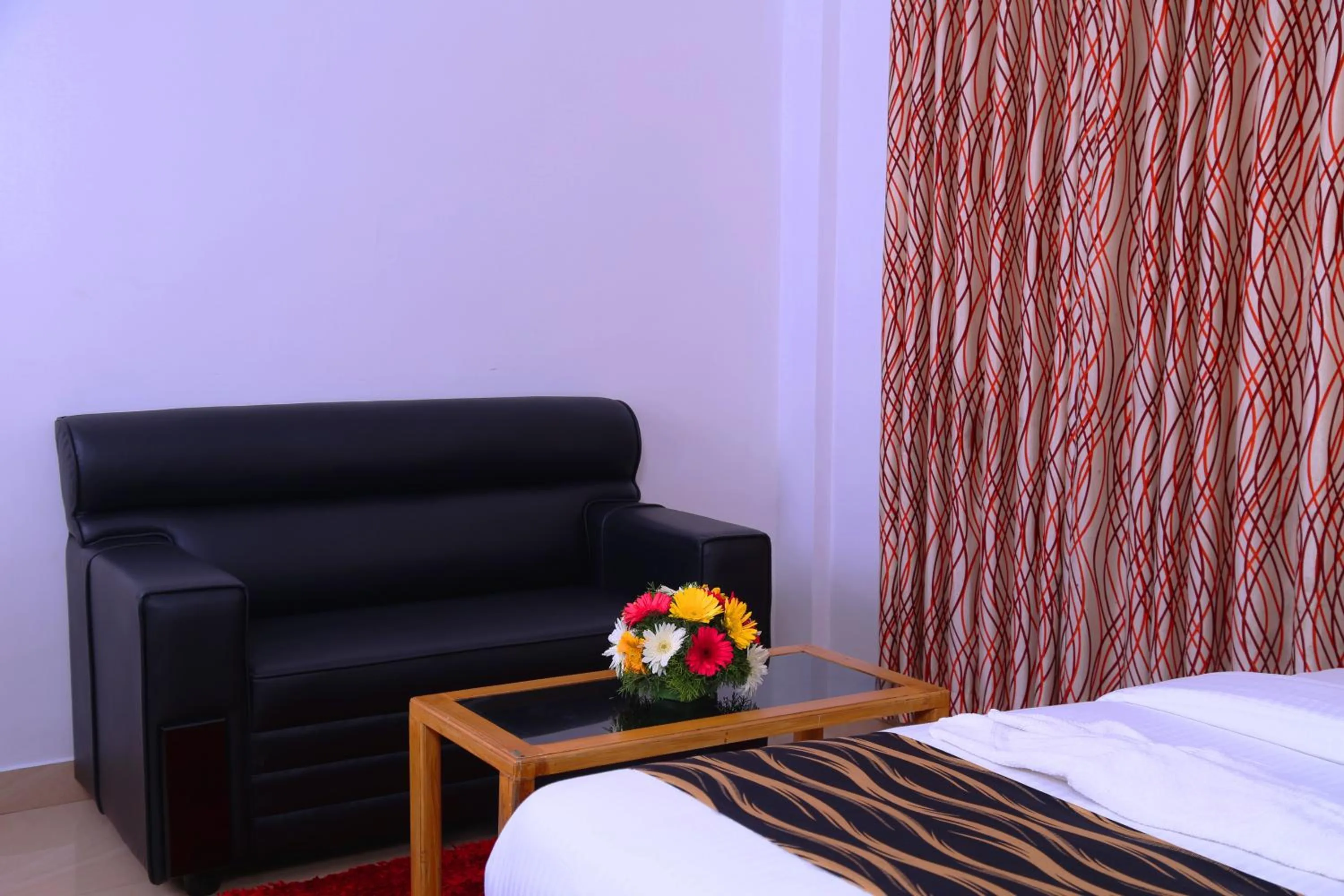 Bed in Pine Tree Munnar