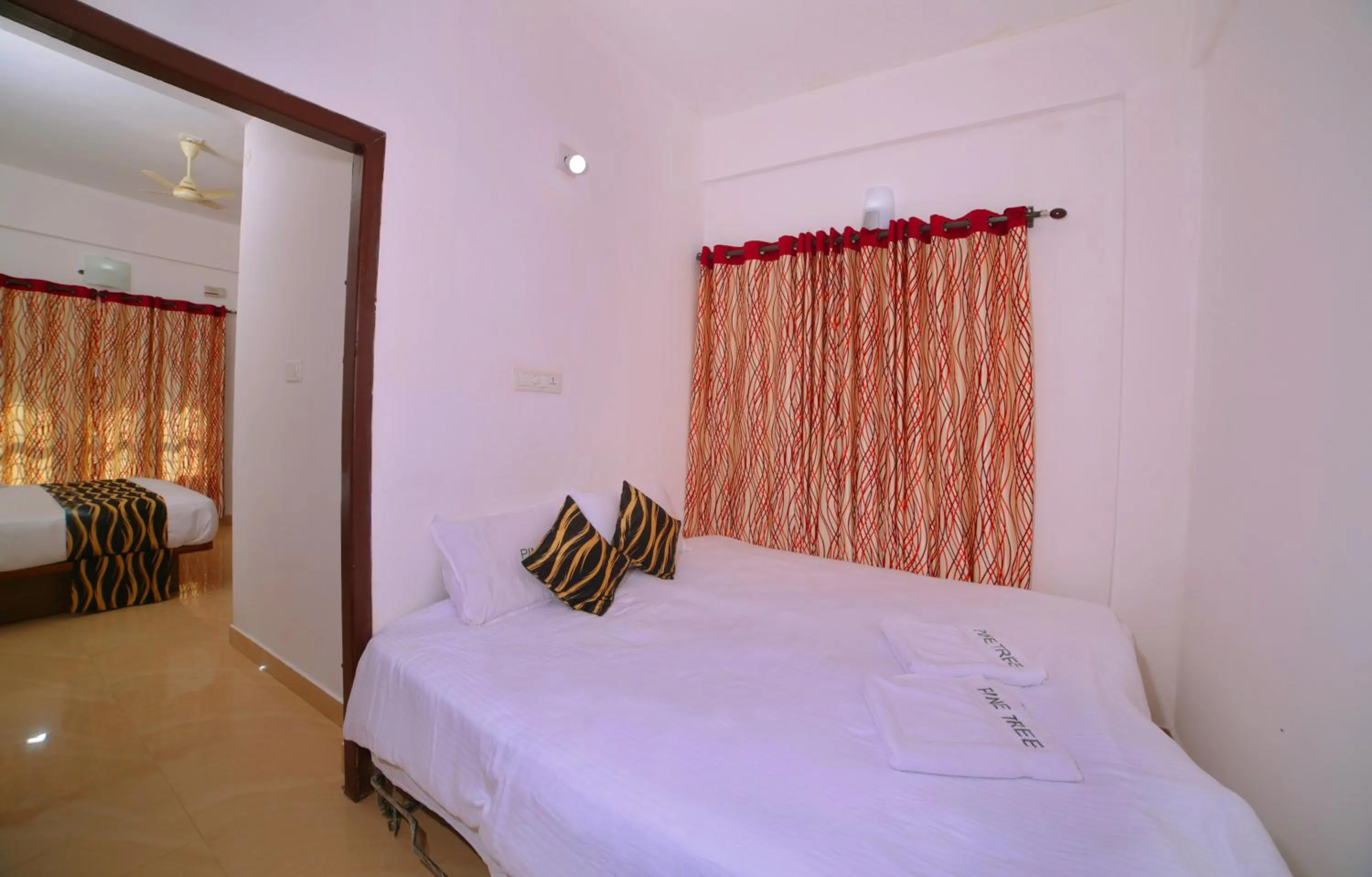 Bed in Pine Tree Munnar