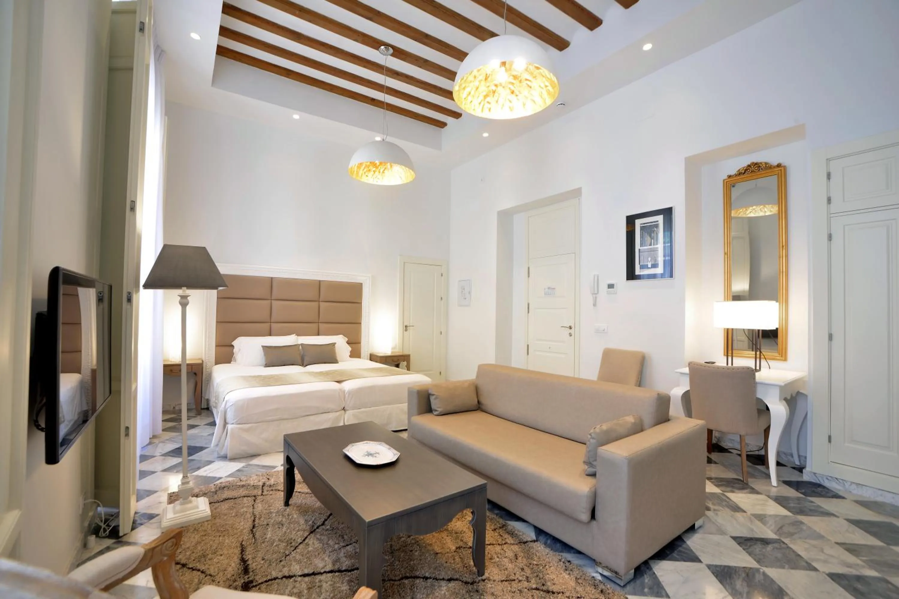 Living room, Bed in El Armador Casa Palacio by Luxury Suites Cádiz