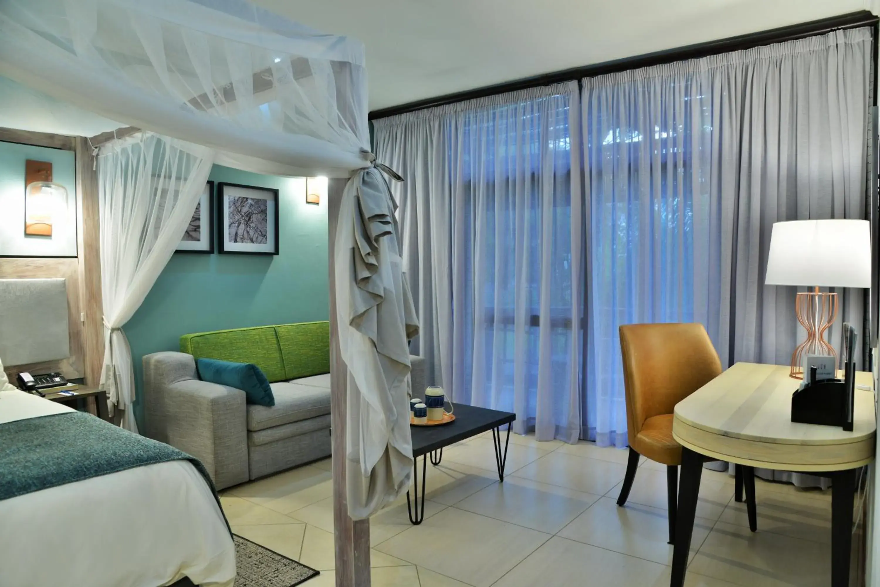 Seating area, Bed in Cresta Mowana Safari Resort & Spa Seating area, Bed in Cresta Mowana Safari Resort & Spa