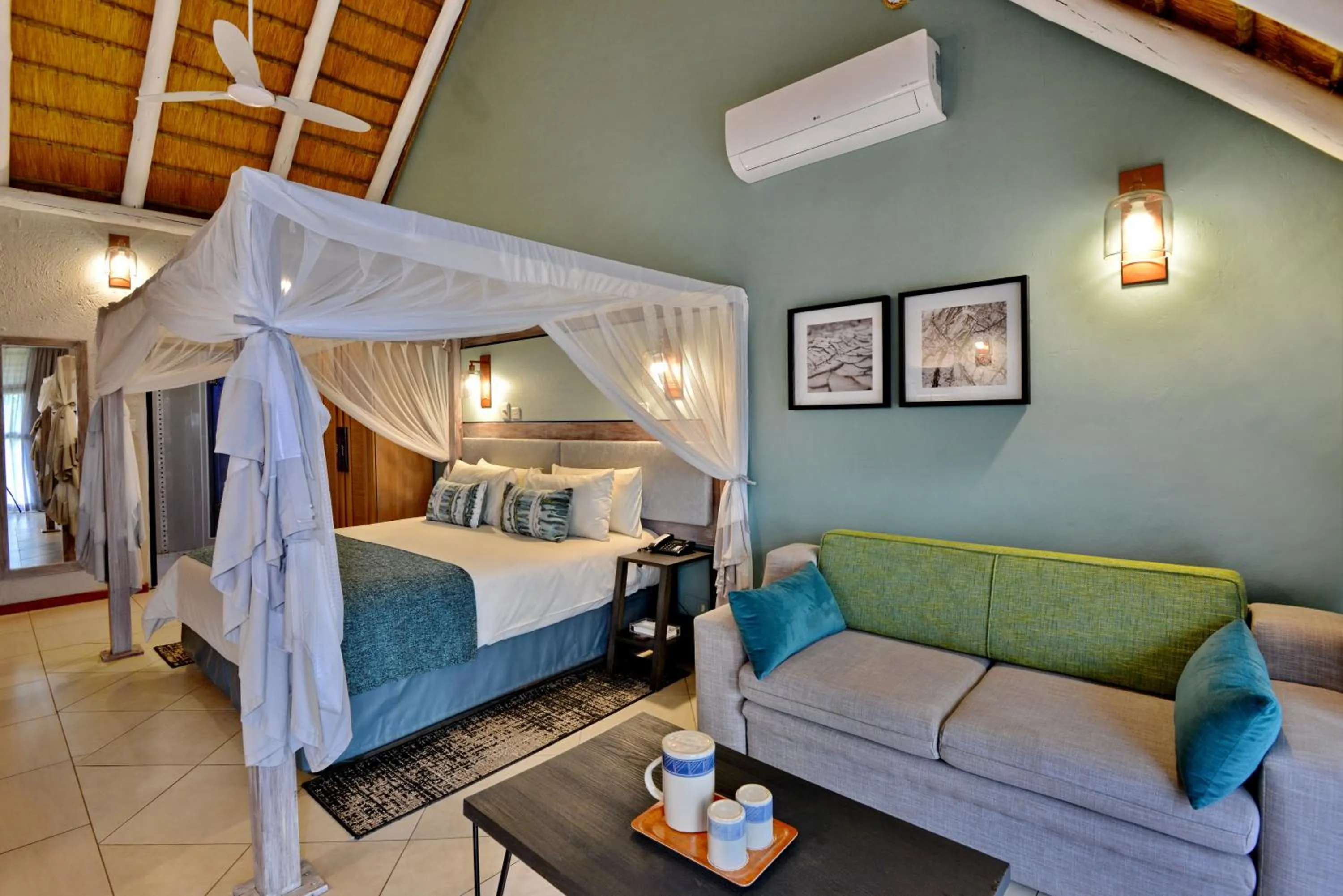 Seating area, Bed in Cresta Mowana Safari Resort & Spa