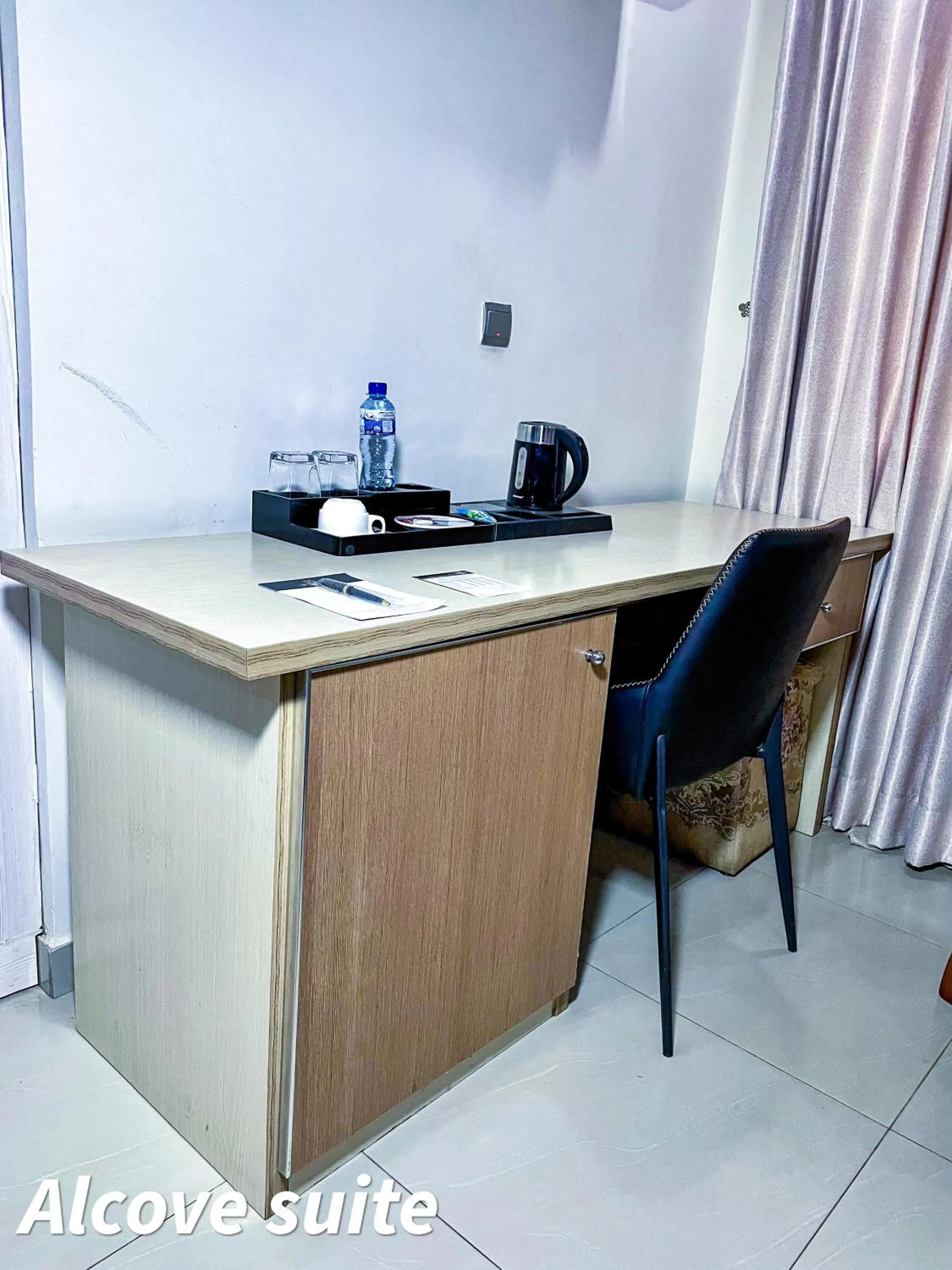 Deluxe Double Room (2 Adults + 1 Child) in D'Franklin Apartments and Event Center