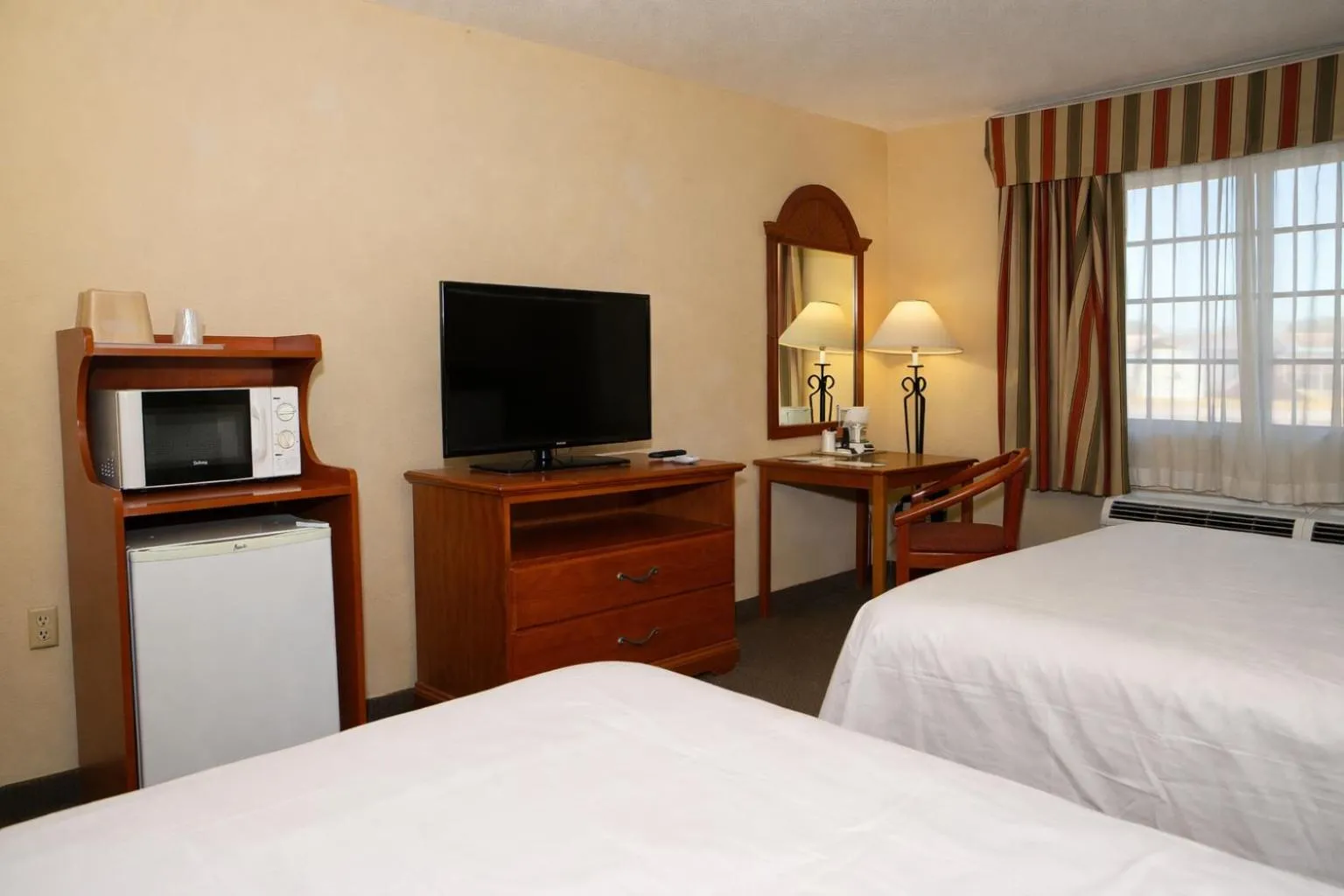 Bed in Knights Inn Gallup at 3208 W Hwy 66