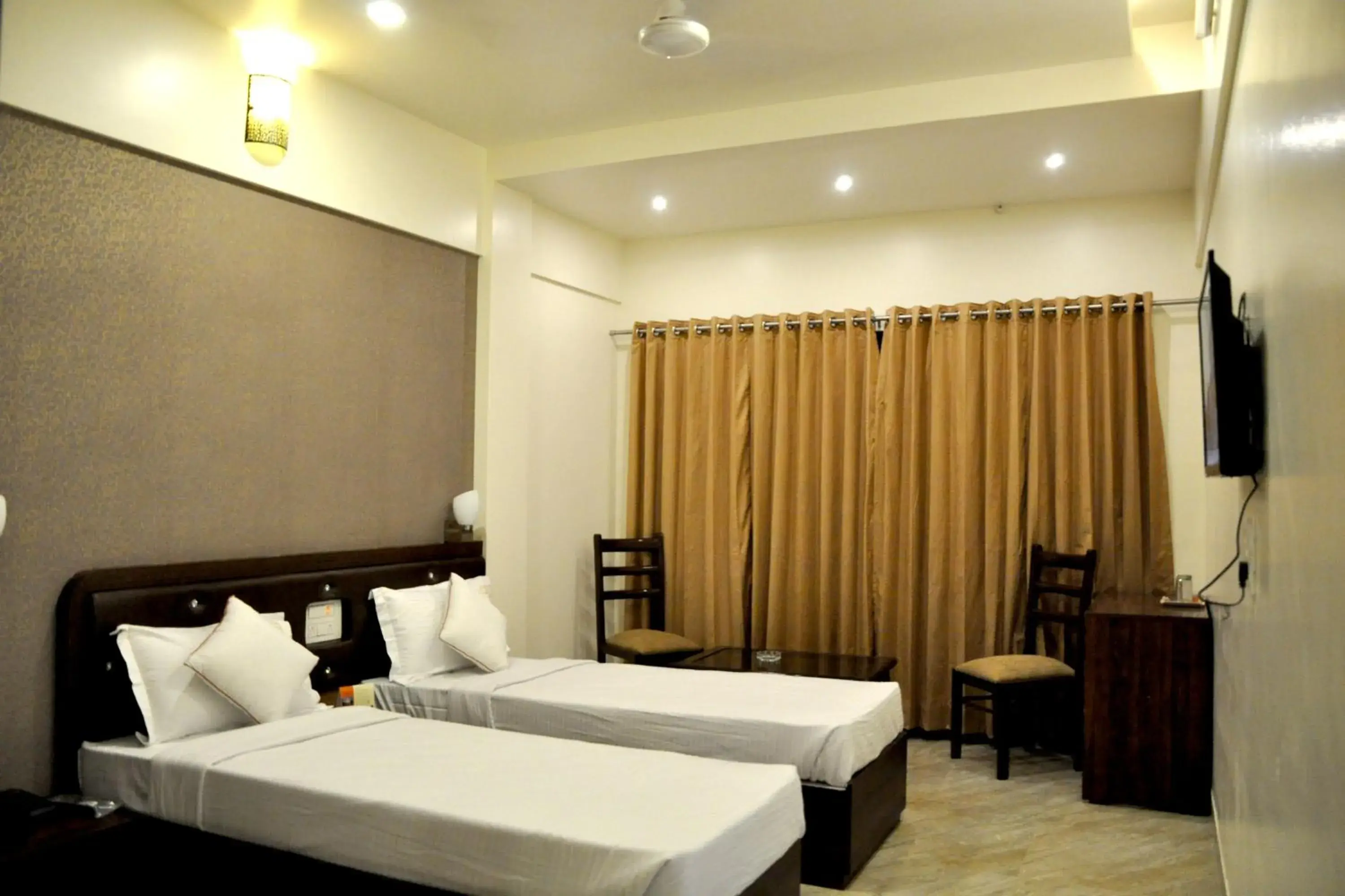 Bed in Hotel Gulmohar Pride Bed in Hotel Gulmohar Pride