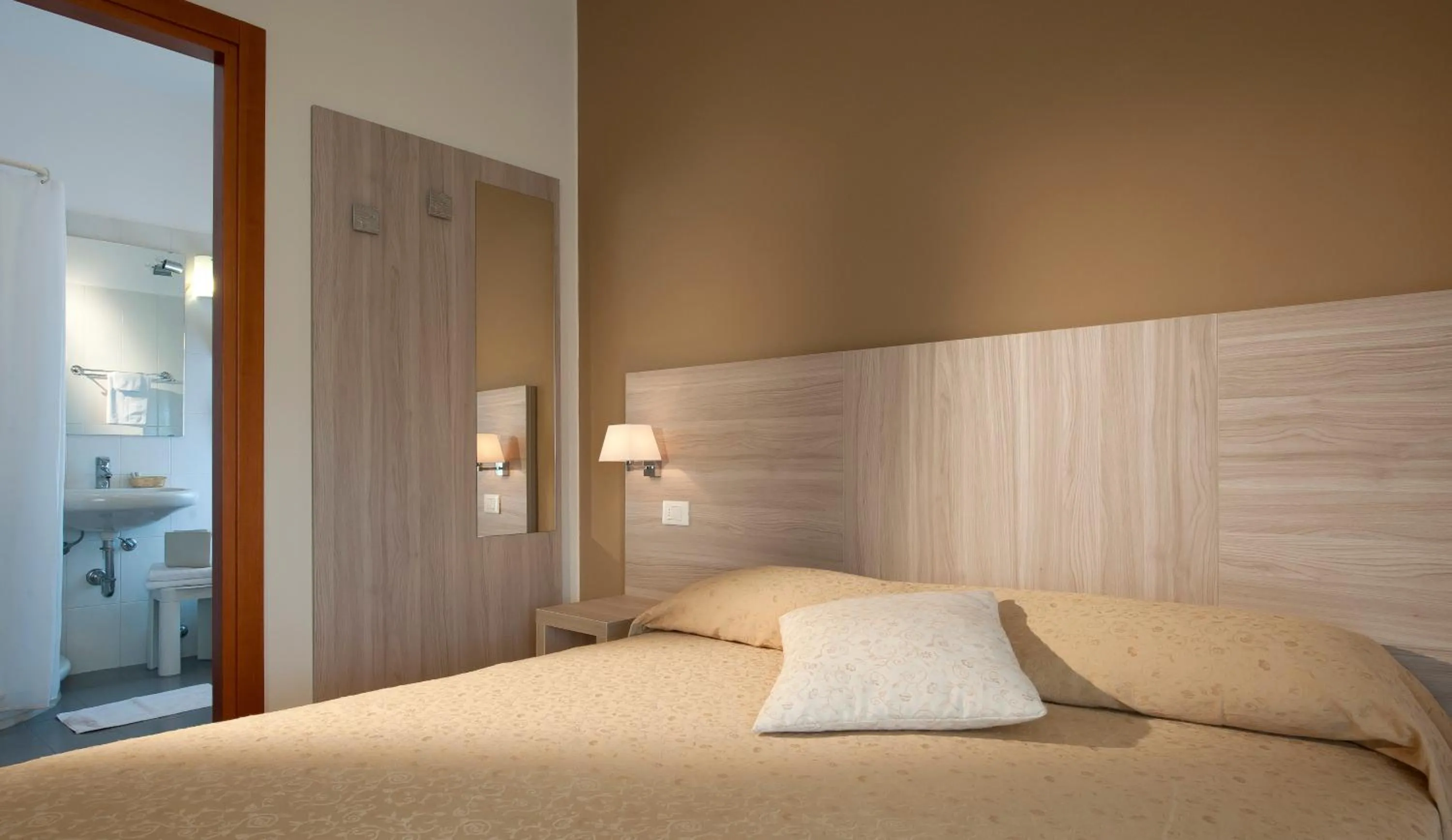 Bed in Albergo Valentina